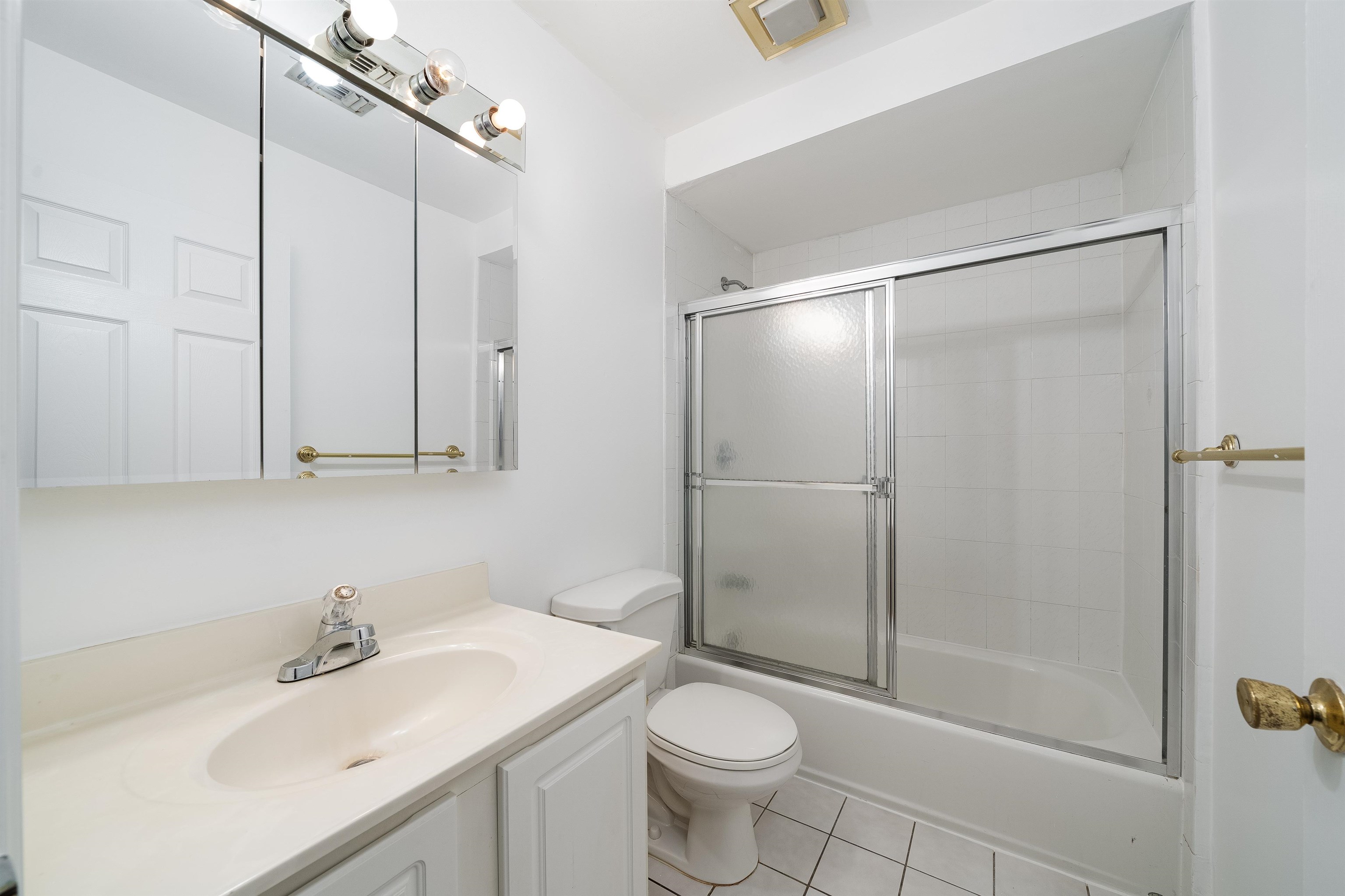 639 Garden Street, Unit 1 Hoboken, NJ 07030 - Photo 7 of 17 a bathroom with a sink toilet and shower