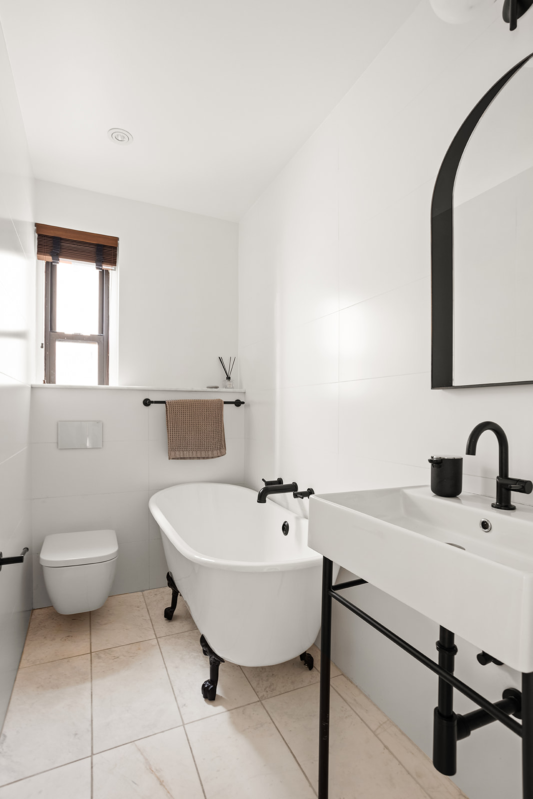 35-36 76th Street, Unit 123 Queens, NY 11372 - Photo 7 of 11 a bathroom with a sink and a mirror