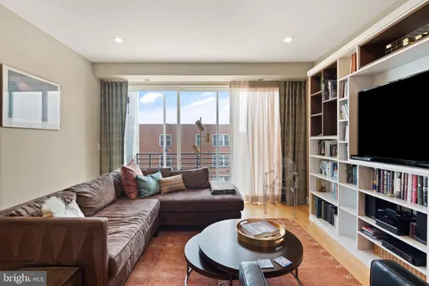 a shelf with books and knick knacks on it