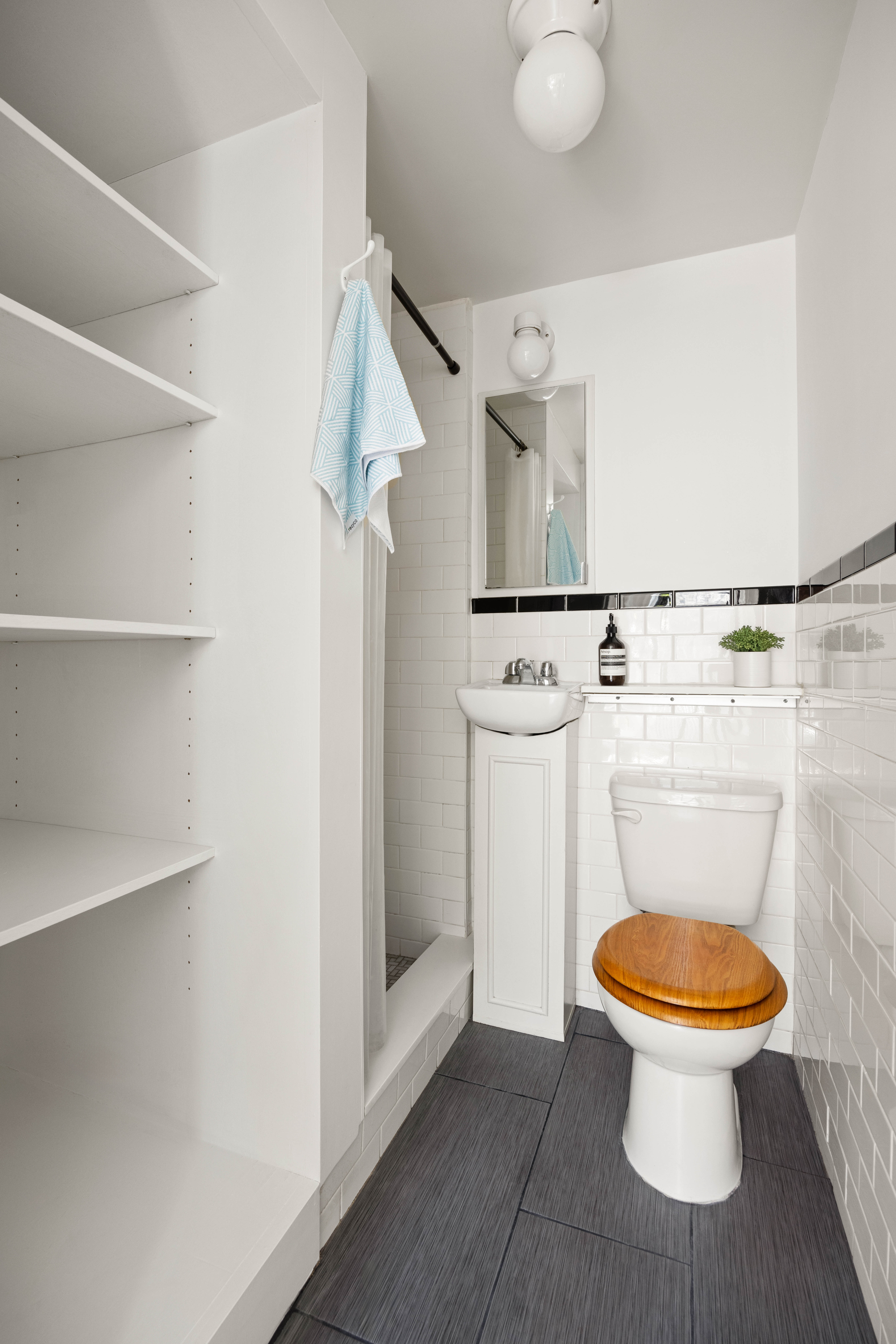 144 Park Place, Unit 3 Brooklyn, NY 11217 - Photo 5 of 6 a bathroom with a toilet and a sink
