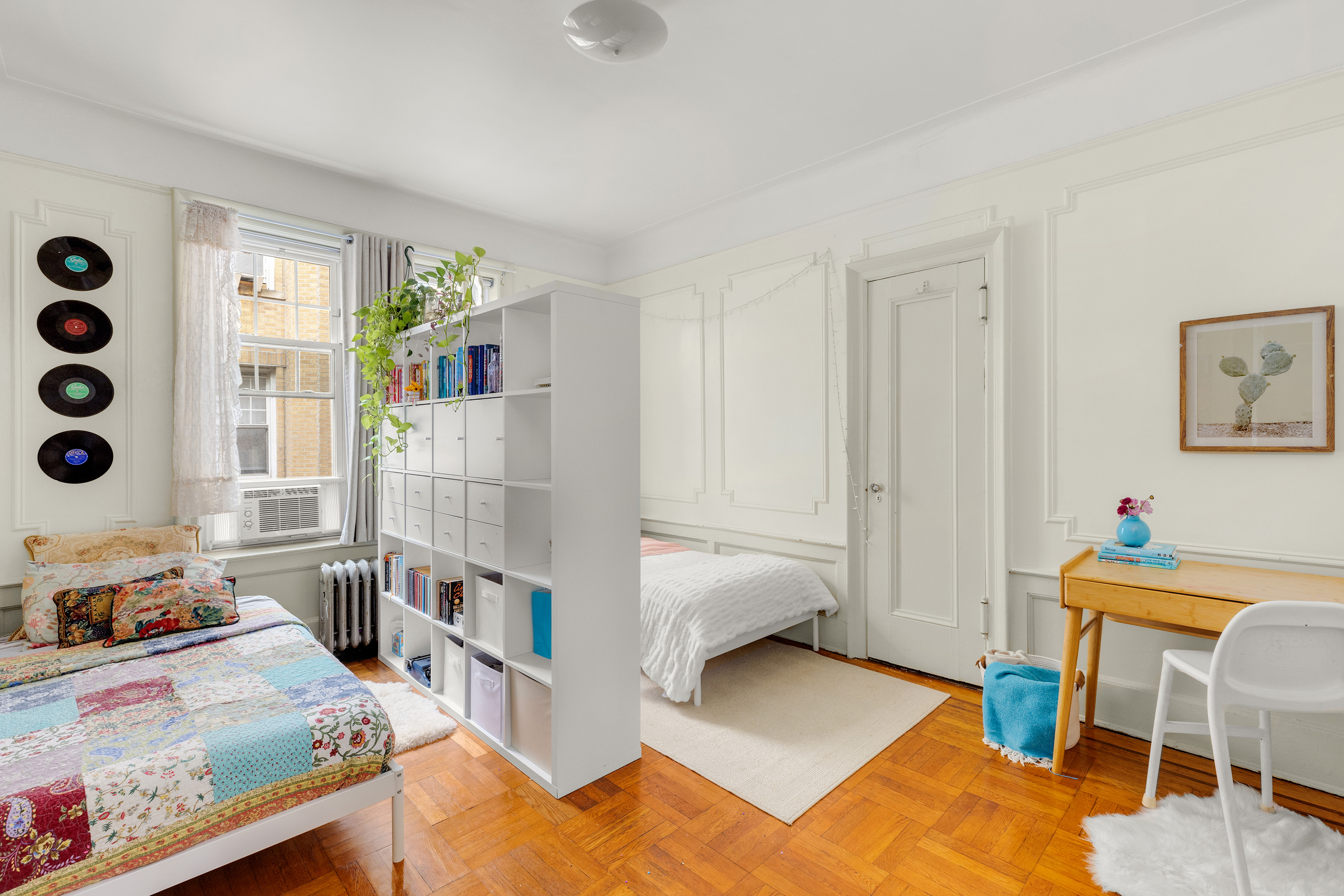 765 42nd Street, Unit 20 Brooklyn, NY 11232 - Photo 5 of 10 a bedroom with furniture and a large window