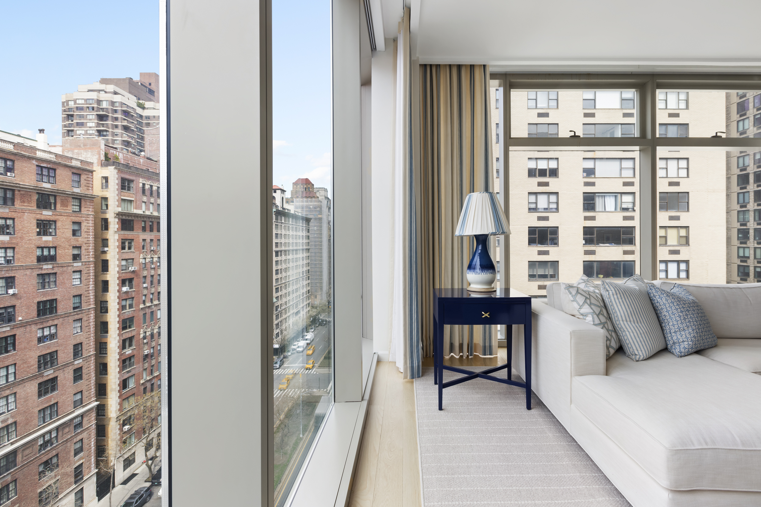 1055 Park Avenue, Unit PH Manhattan, NY 10028 - Photo 4 of 19 a balcony view with a couch