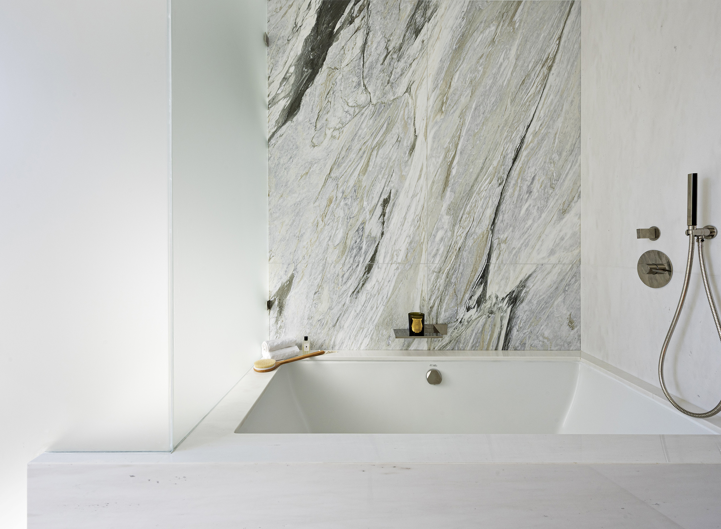 200 Amsterdam Avenue, Unit 17A Manhattan, NY 10023 - Photo 9 of 24 a bathroom with a bathtub