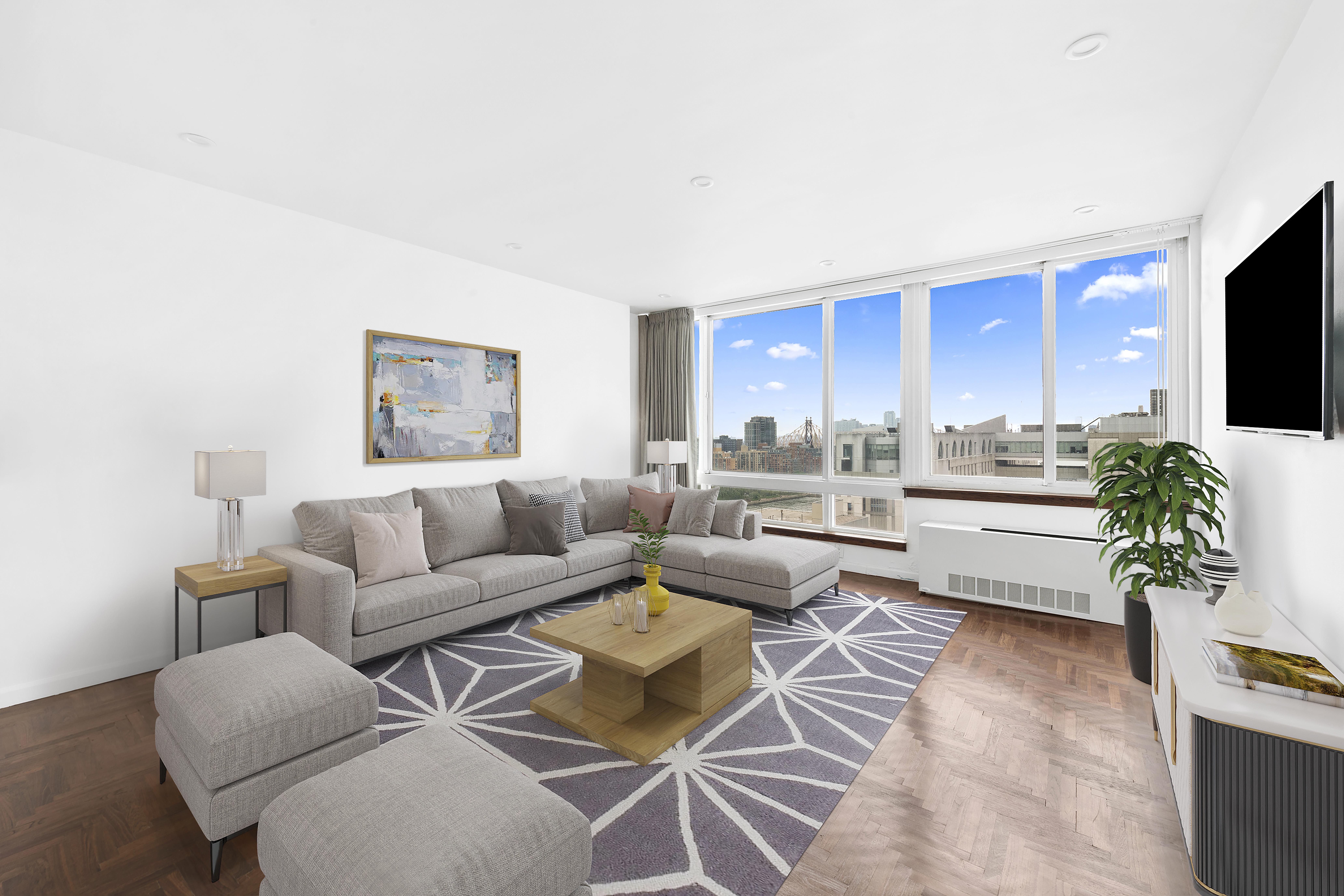 524 East 72nd Street, Unit 26A Manhattan, NY 10021 - Photo 1 of 16 a living room with furniture a flat screen tv and a potted plant