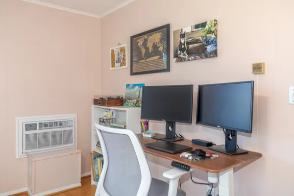 a workspace with furniture and lamp