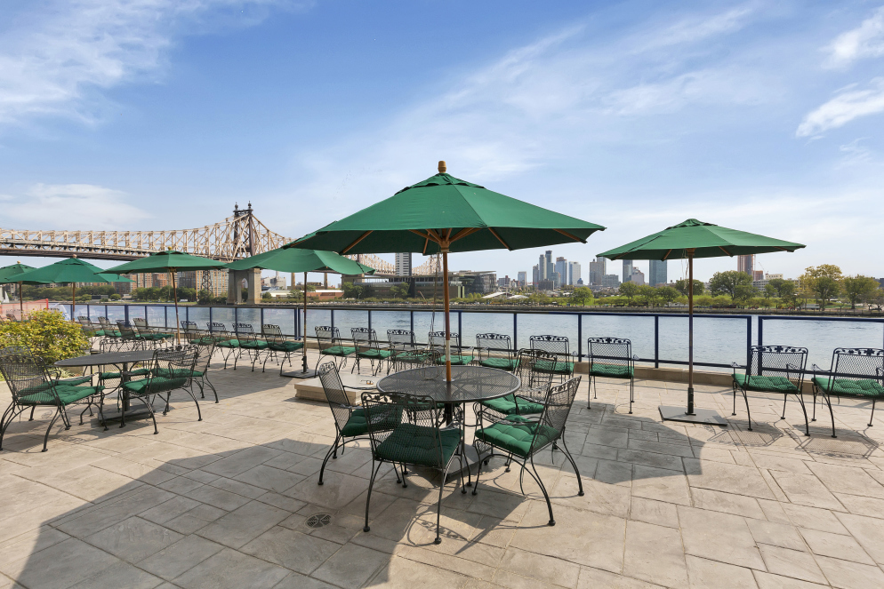 25 Sutton Place South, Unit 16B Manhattan, NY 10022 - Photo 12 of 16 a view of a chairs and table in the terrace