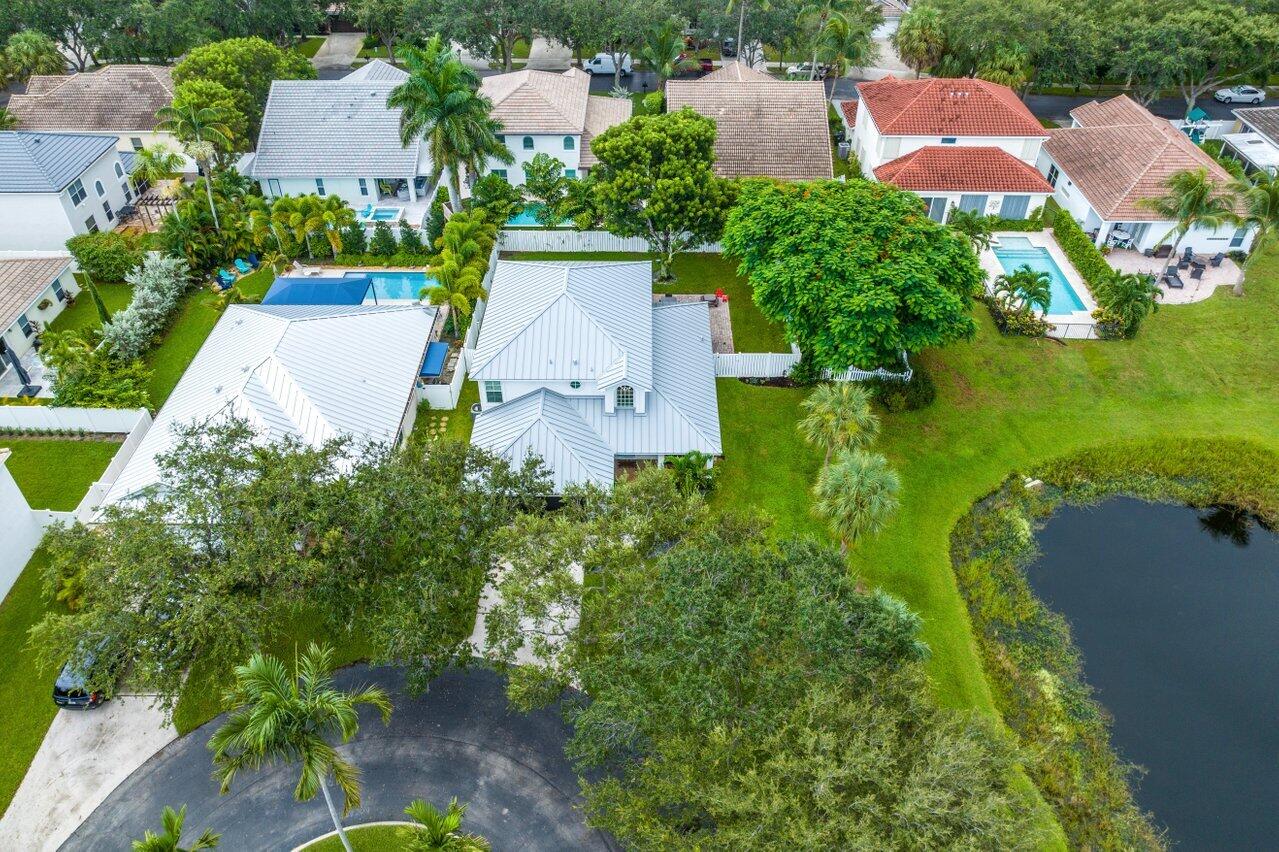 1182 Canoe Point Delray Beach, FL 33444 - Photo 38 of 46 an aerial view of a house with a garden