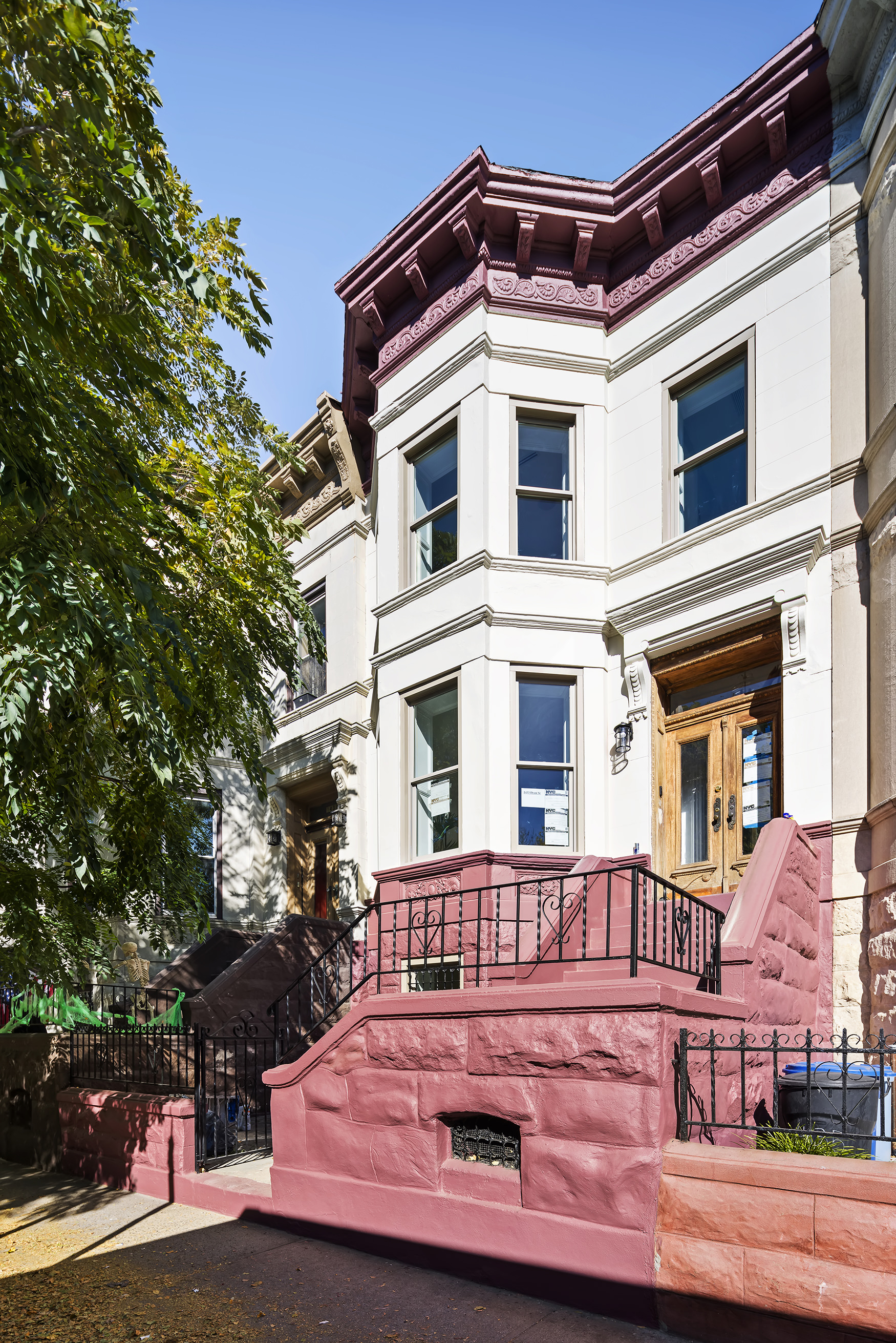 1433 Dean Street Brooklyn, NY 11213 - Photo 16 of 18 a view of a house with a small yard