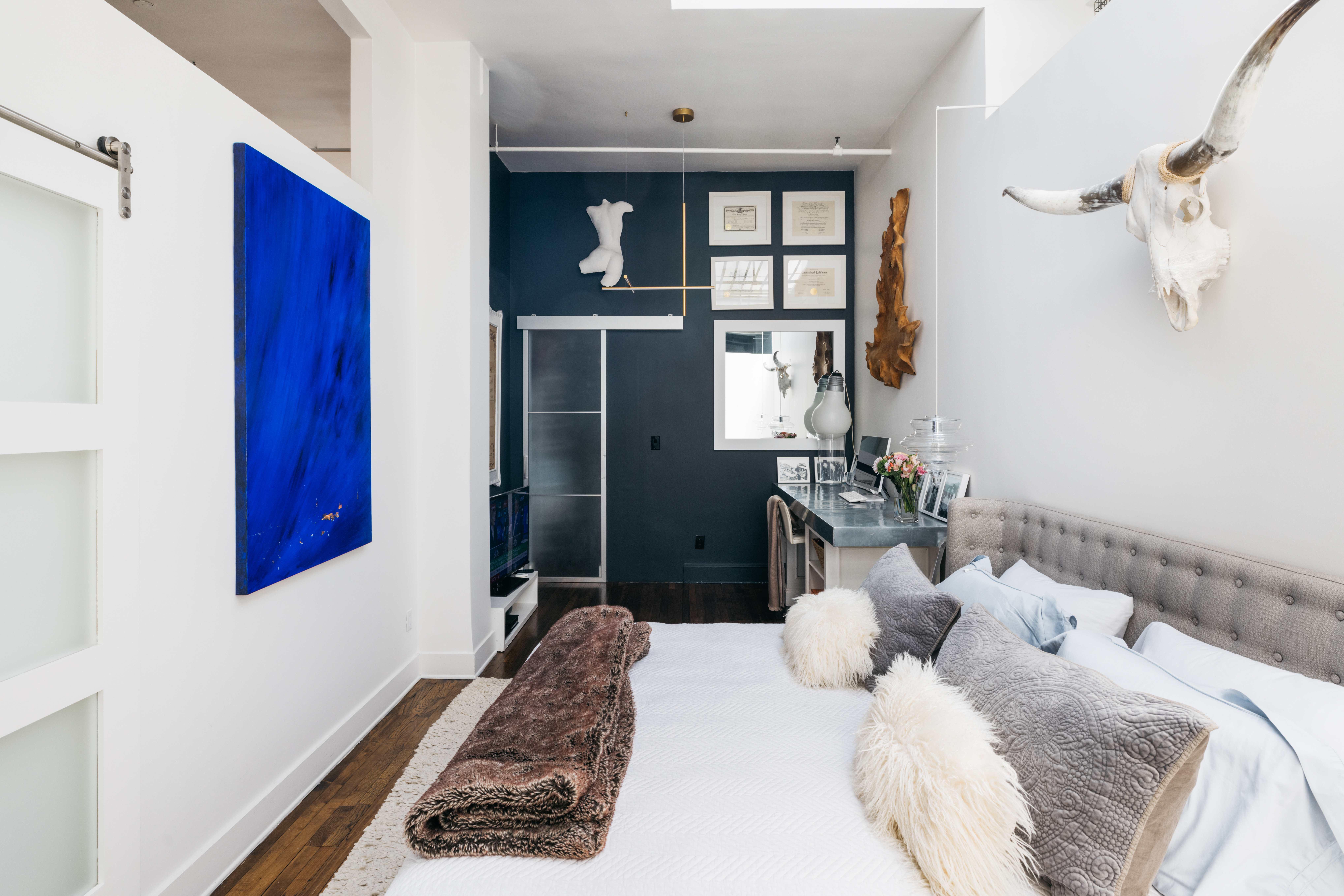 718 Broadway, Unit PHC Manhattan, NY 10003 - Photo 7 of 21 a bedroom with a bed and a window