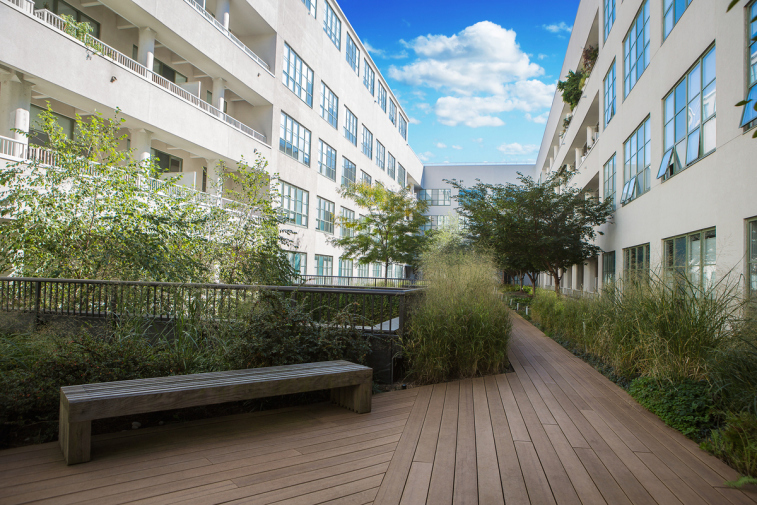 184 Kent Avenue, Unit D315 Brooklyn, NY 11249 - Photo 12 of 19 a view of balcony with hardwood floor and outdoor space