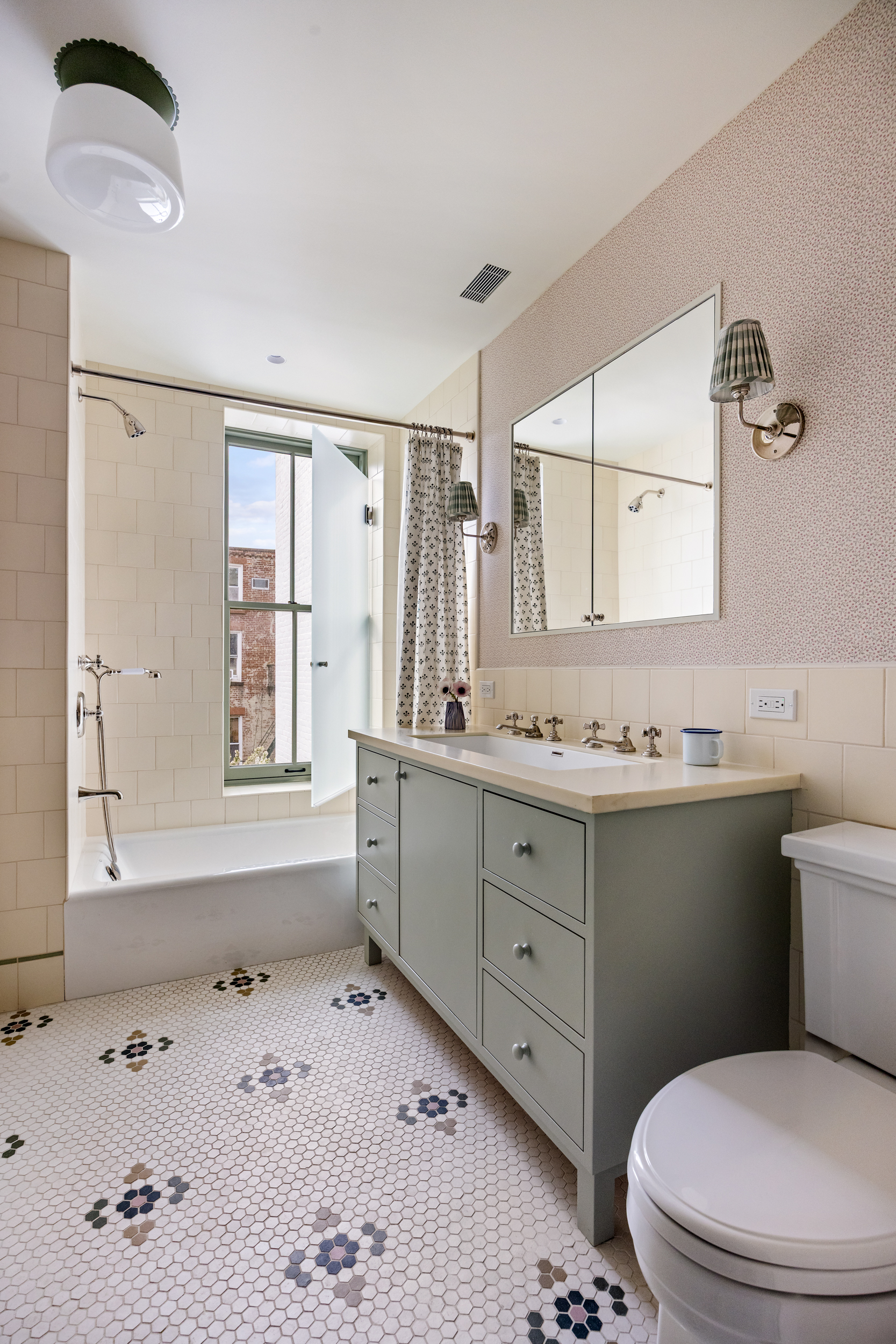40 Garden Place Brooklyn, NY 11201 - Photo 21 of 33 a bathroom with a sink a toilet and mirror