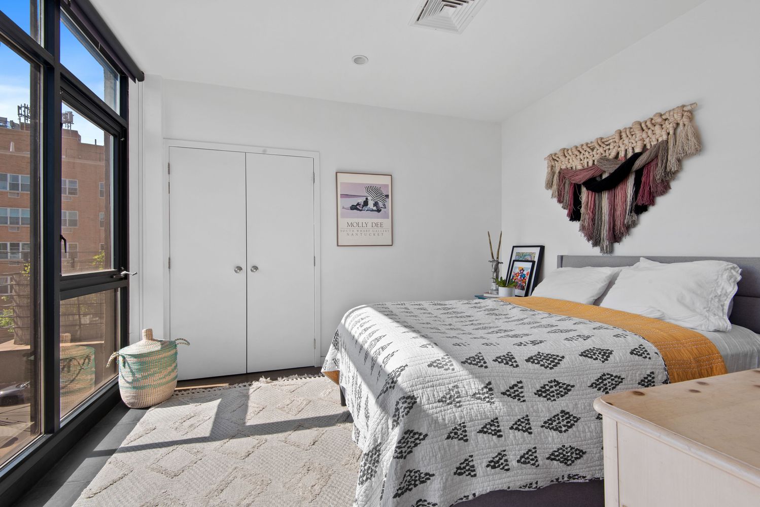 179 Woodpoint Road, Unit 4A Brooklyn, NY 11211 - Photo 8 of 16 a bedroom with a bed and a window