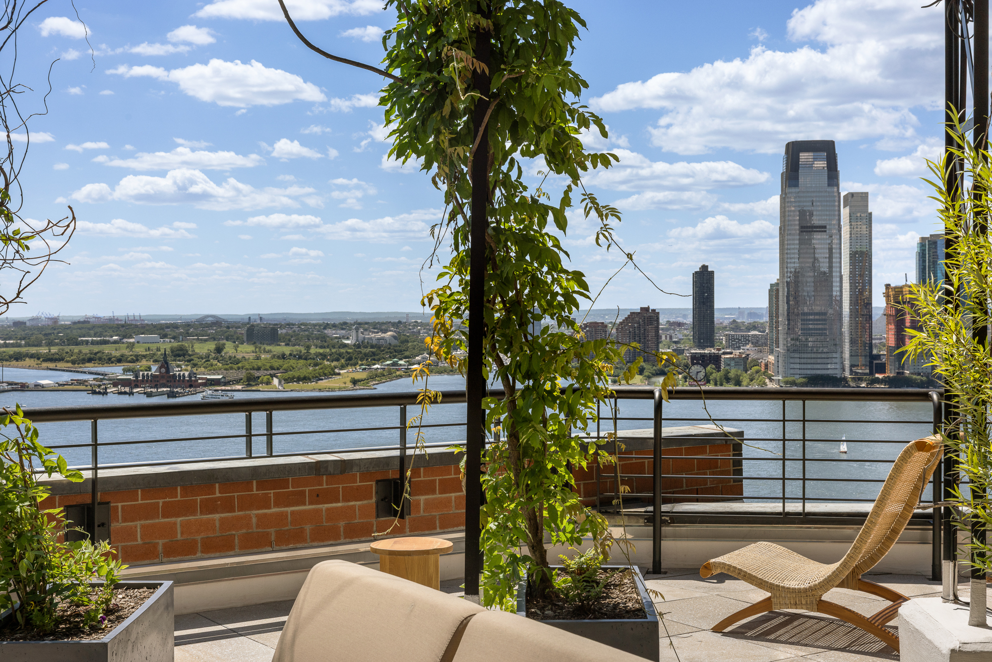377 Rector Place, Unit PHA Manhattan, NY 10280 - Photo 13 of 48 a view of a city from a terrace