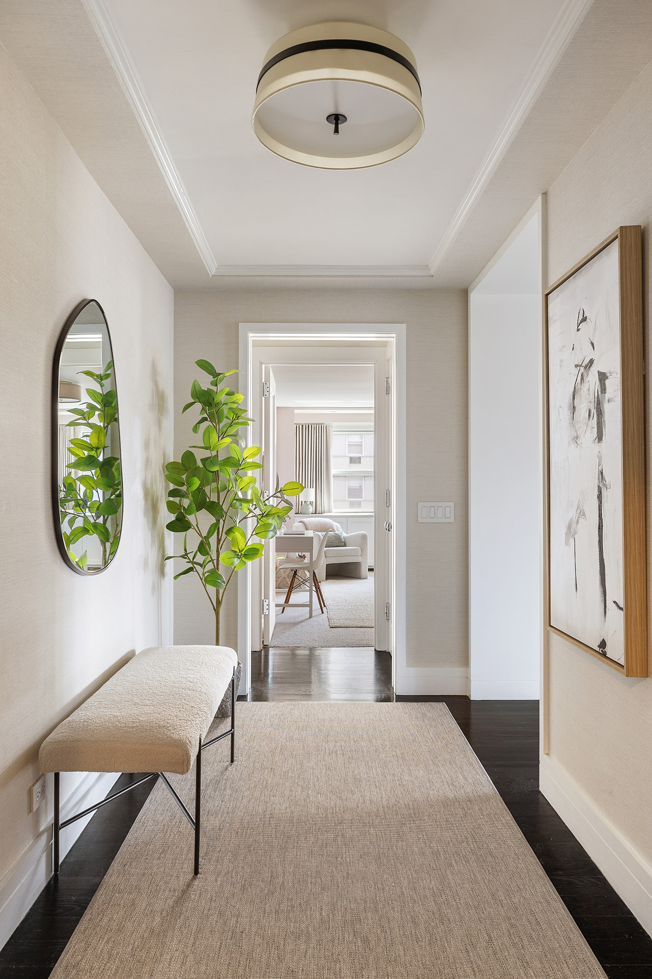 101 West 12th Street, Unit 8RS Manhattan, NY 10011 - Photo 16 of 19 a living room with furniture and a potted plant