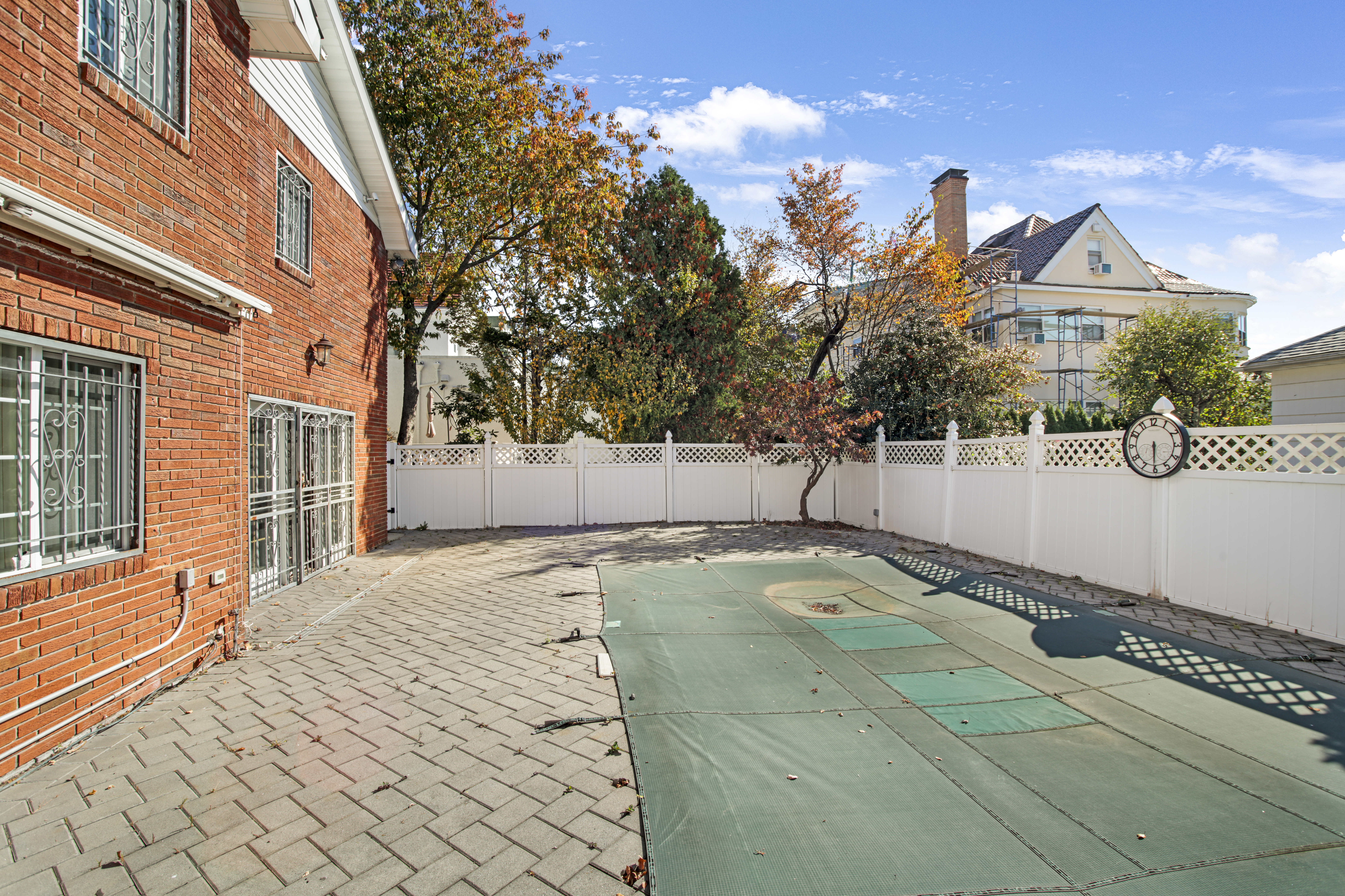 60 82nd Street Brooklyn, NY 11209 - Photo 18 of 19 a view of a house with snow on the road