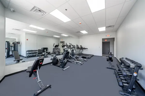 a view of a room with gym equipment