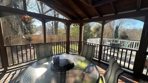 a view of a porch with furniture
