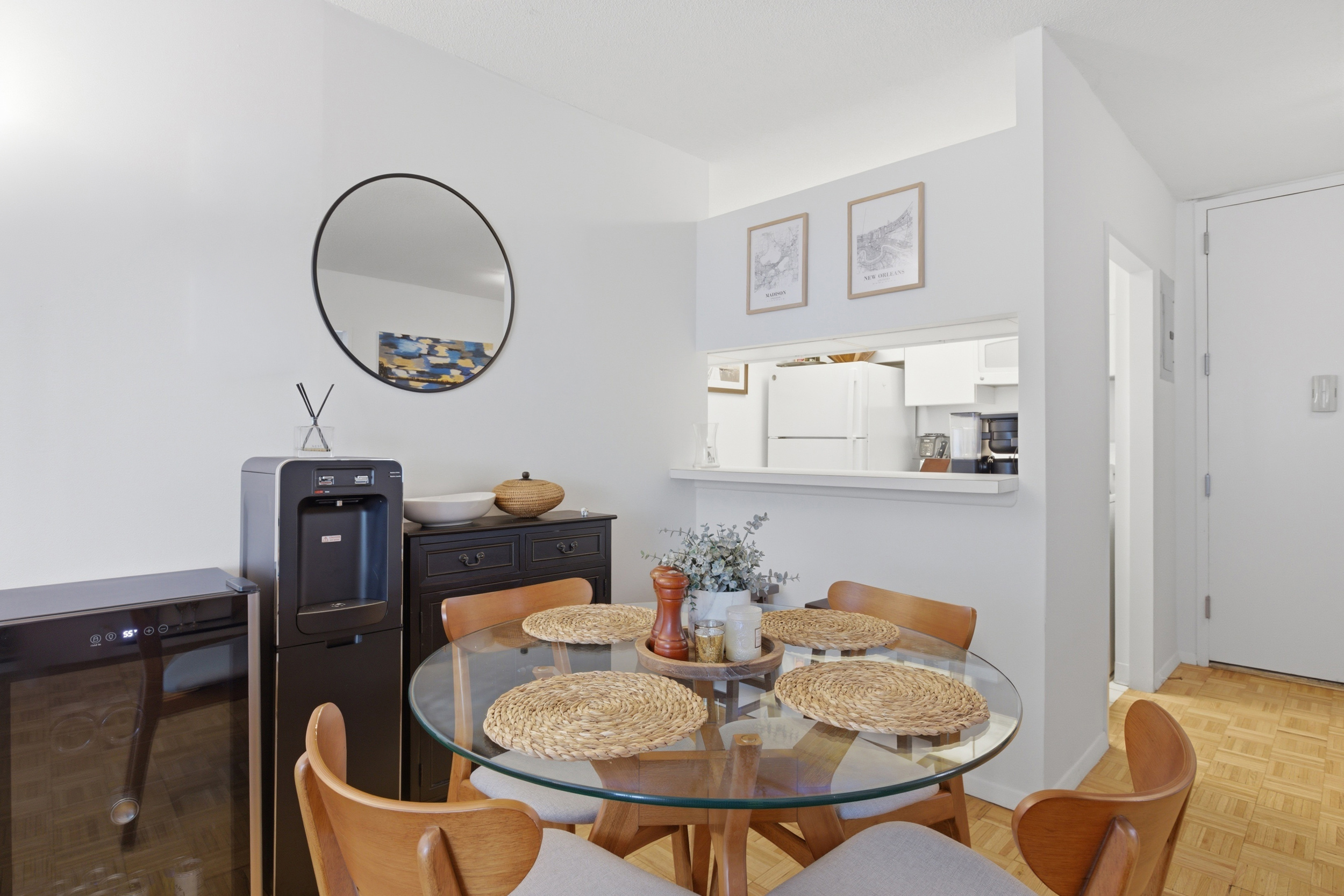 280 Park Avenue South, Unit 5L Manhattan, NY 10010 - Photo 4 of 17 a dining room with furniture and a mirror