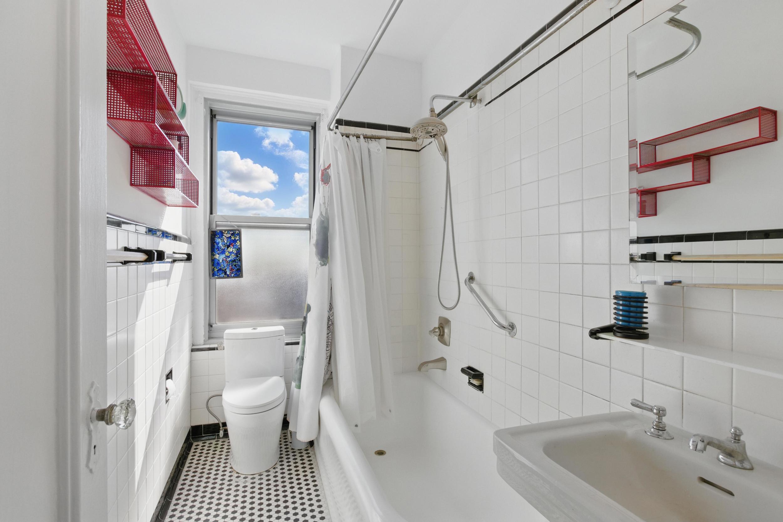 1 Plaza Street West, Unit 12C Brooklyn, NY 11217 - Photo 12 of 13 a bathroom with a sink toilet and shower