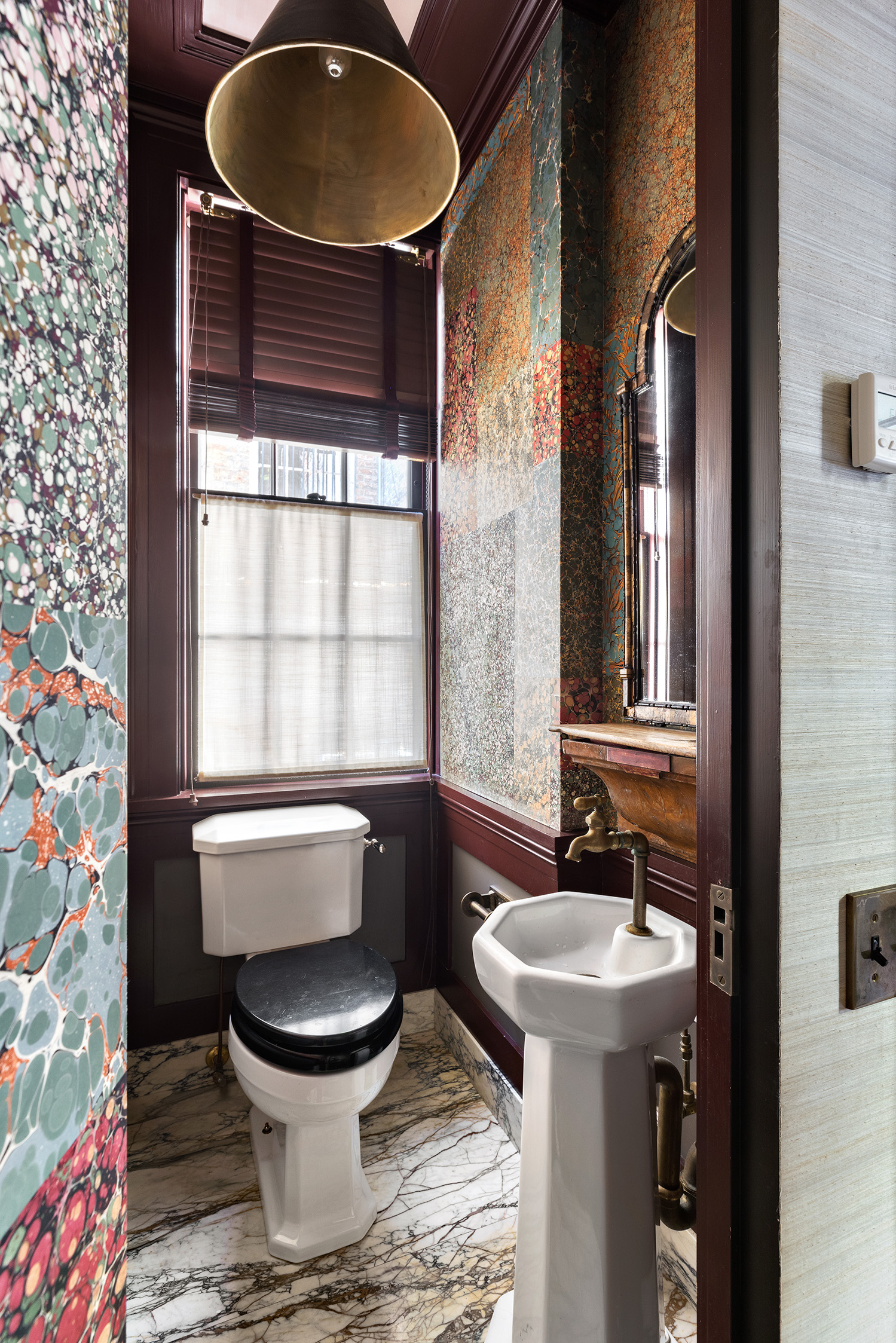 68 Morton Street Manhattan, NY 10014 - Photo 19 of 21 a bathroom with a toilet and a sink