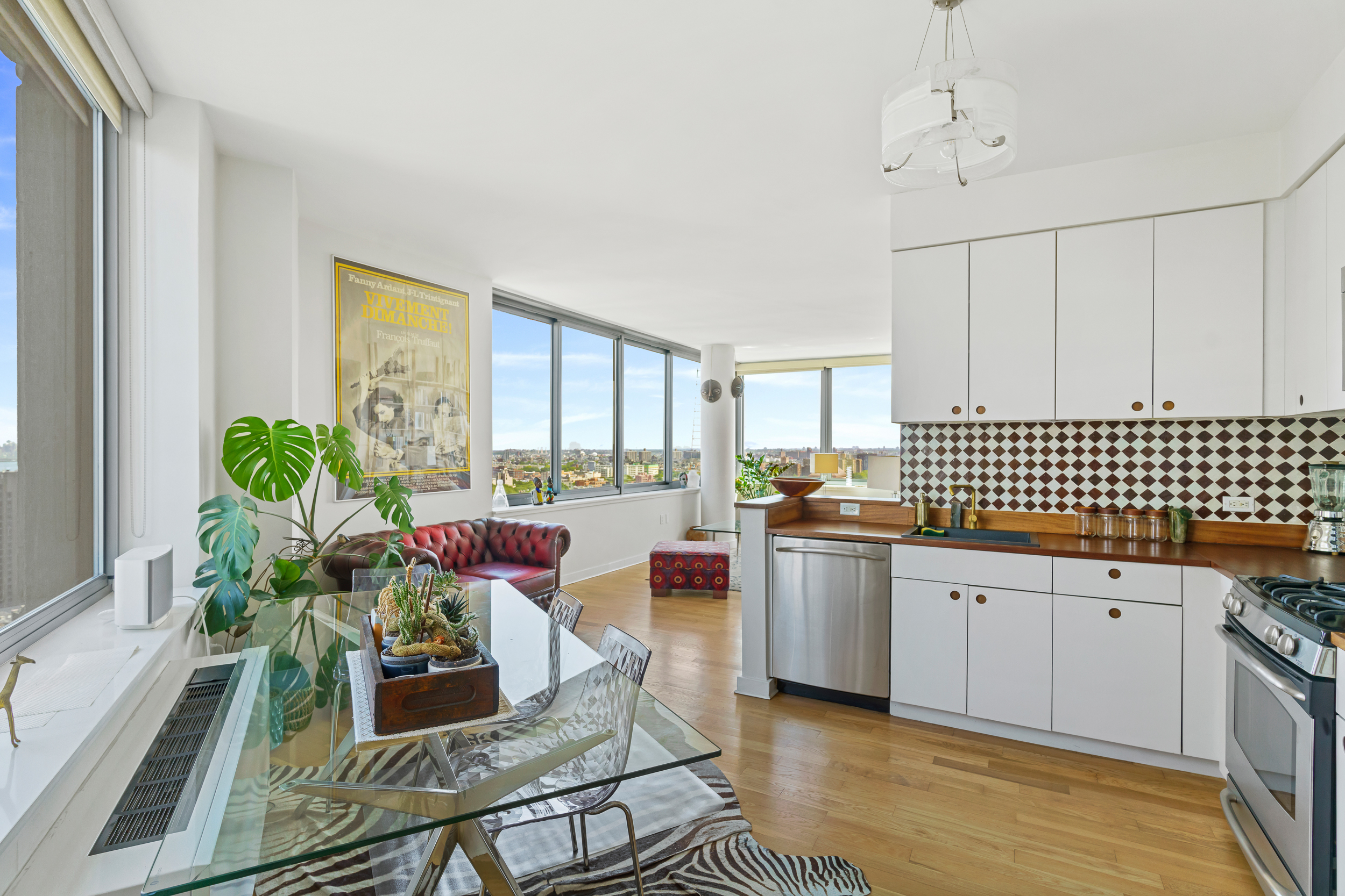 230 Ashland Place, Unit 26A Brooklyn, NY 11217 - Photo 3 of 12 a living room with furniture and a potted plant
