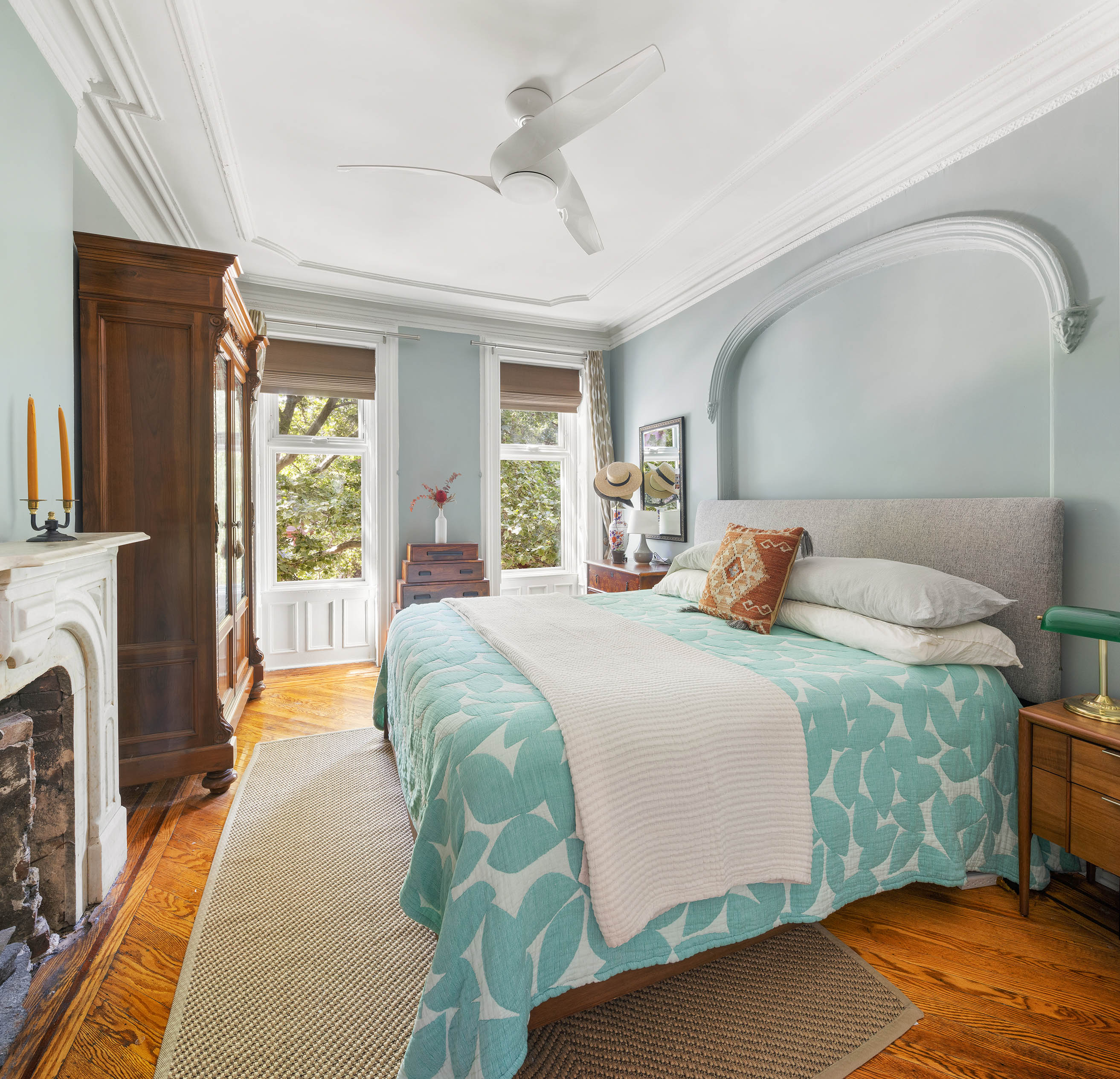 379 Monroe Street Brooklyn, NY 11221 - Photo 8 of 15 a bedroom with a bed and glass door