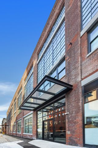 51 Jay Street, Unit 5J Brooklyn, NY 11201 - Photo 22 of 23 a view of a building with brick walls