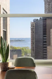 a view of balcony with a potted plant