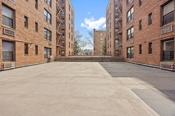 a view of a building with a street