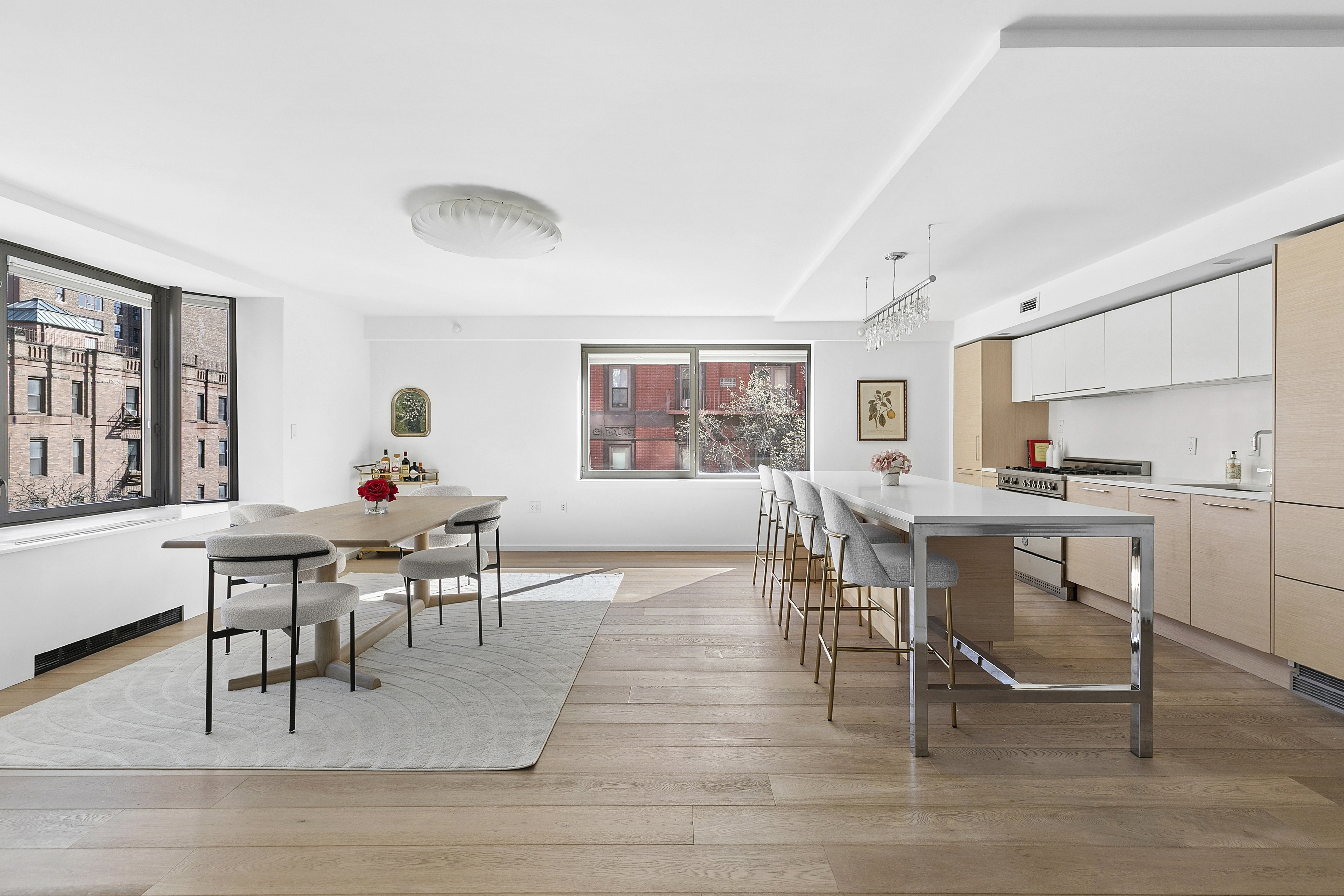 101 West 87th Street, Unit 505 Manhattan, NY 10024 - Photo 1 of 15 a view of a dining room with furniture and wooden floor