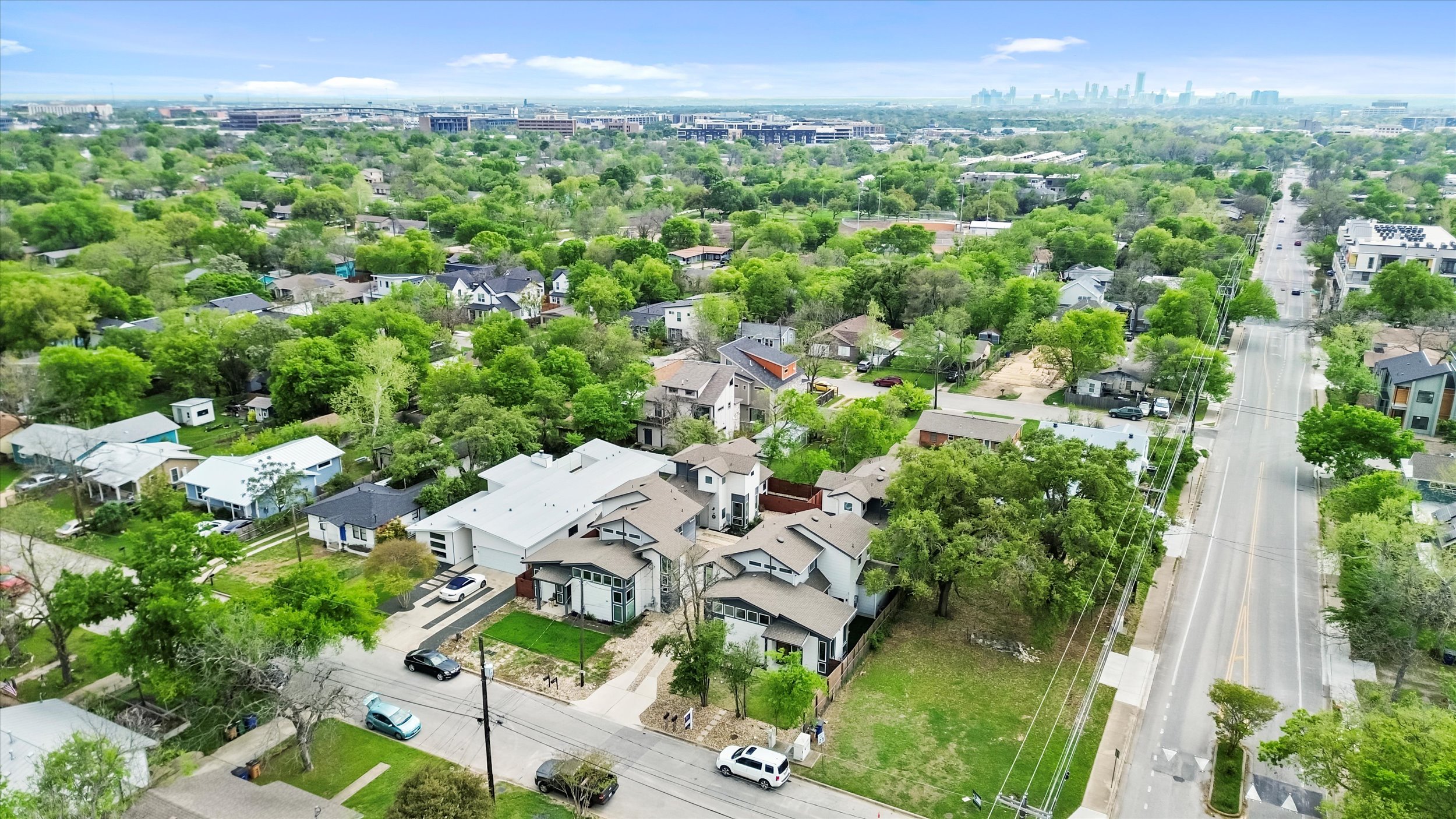 513 West Croslin Street, Unit A Austin, TX 78752 - Photo 35 of 39 an aerial view of residential houses with outdoor space and trees