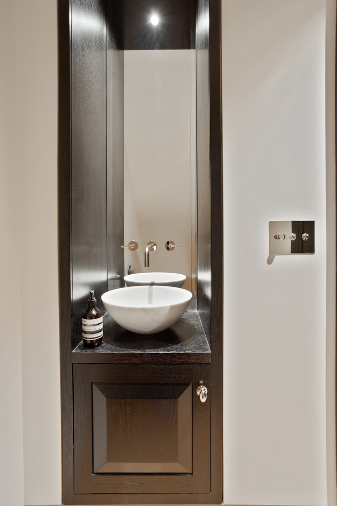 315 Adelphi Street Brooklyn, NY 11205 - Photo 9 of 31 a sink and a mirror