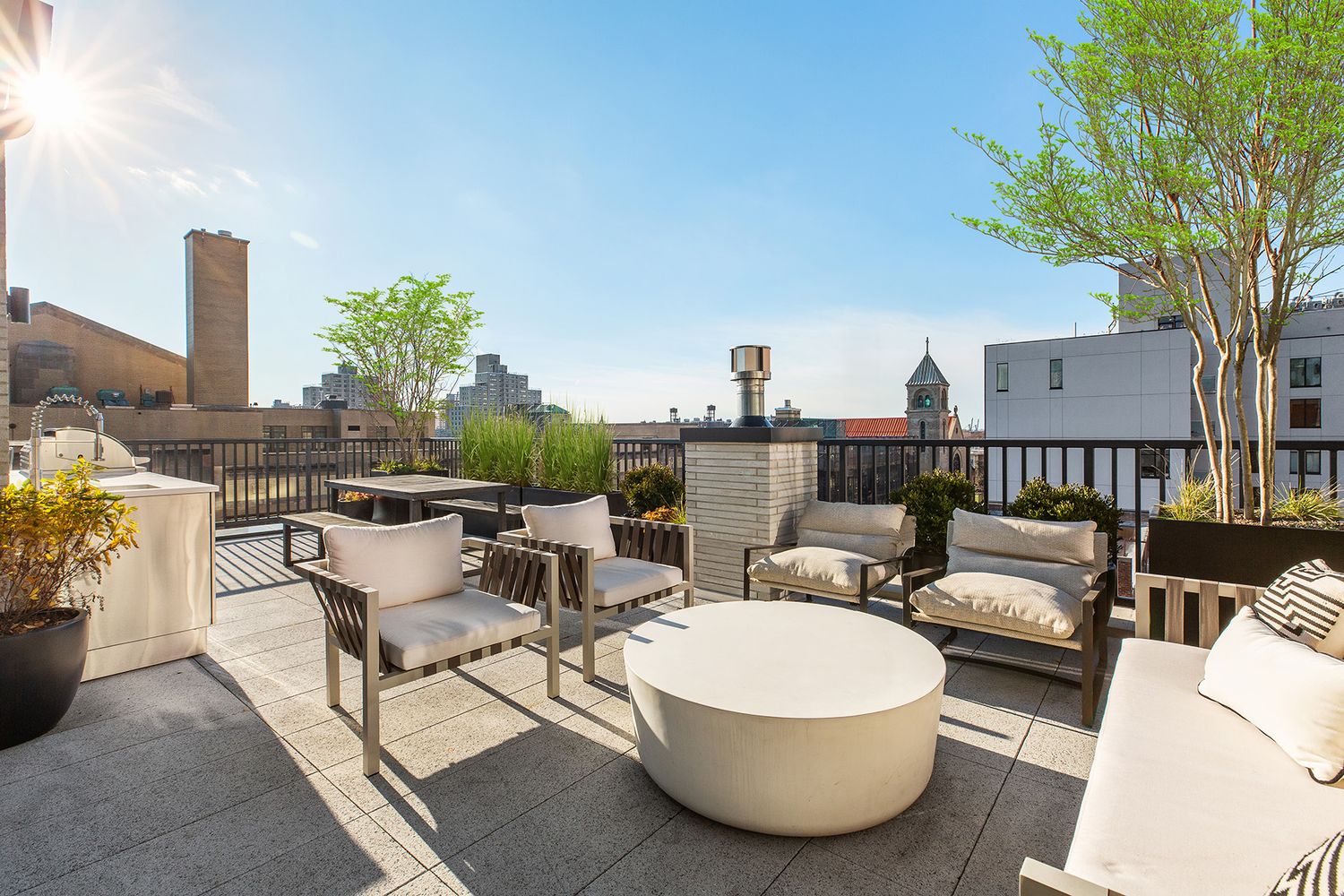 533 Pacific Street, Unit TH537 Brooklyn, NY 11217 - Photo 22 of 25 a outdoor space with patio couch and a fire pit
