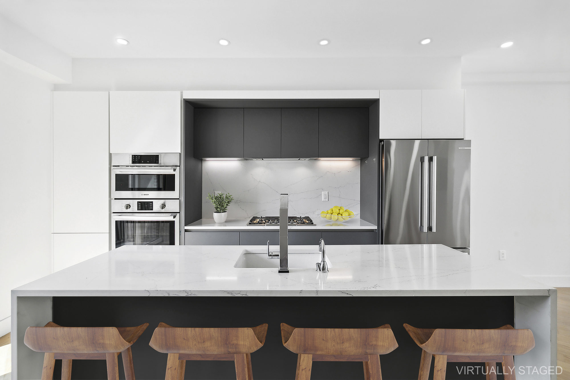 483 Hart Street, Unit 1 Brooklyn, NY 11221 - Photo 4 of 18 a kitchen with a sink a table and chairs