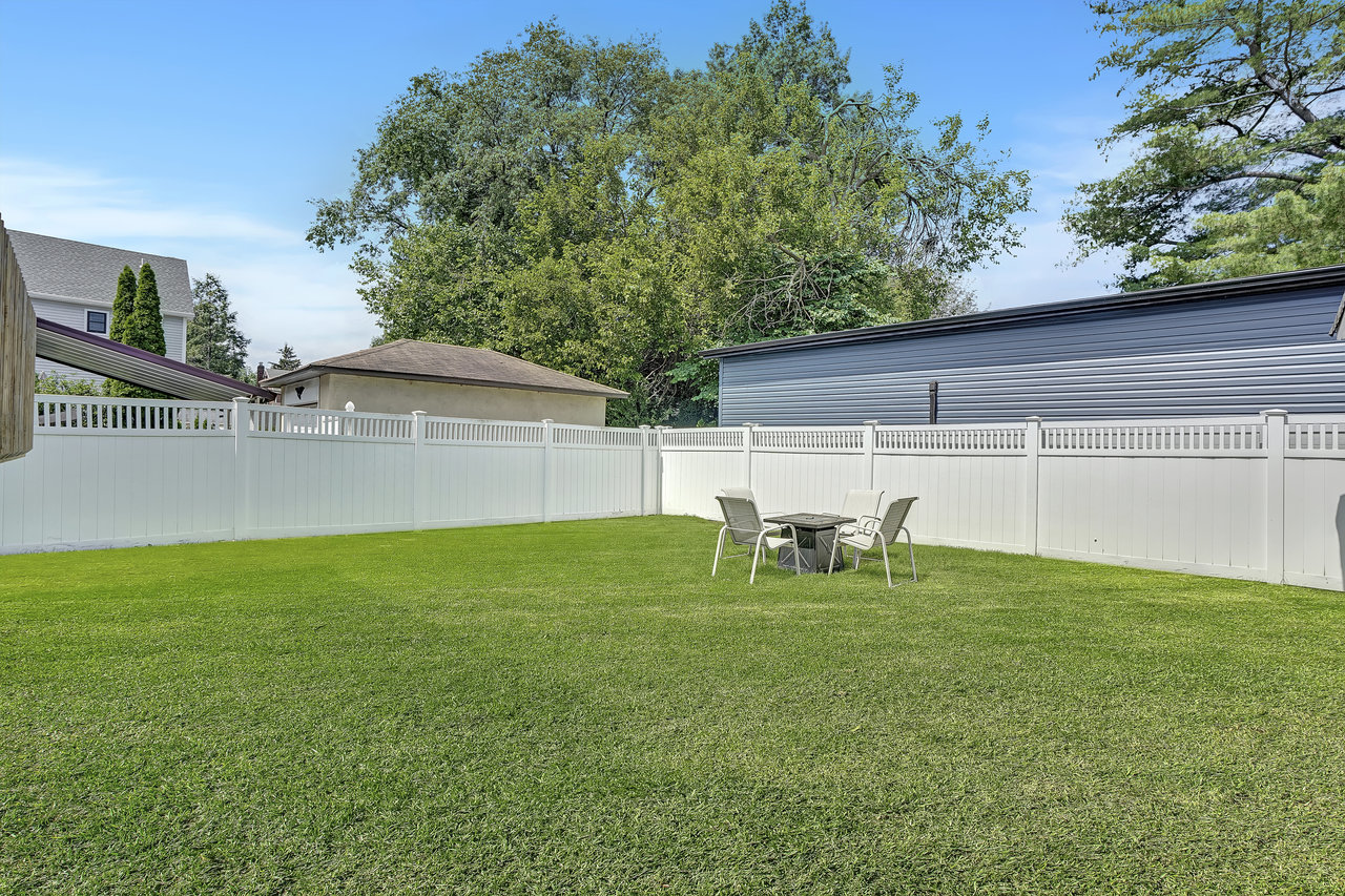 266 Feronia Way Rutherford, NJ 07070 - Photo 35 of 41 a backyard of a house with table and chairs