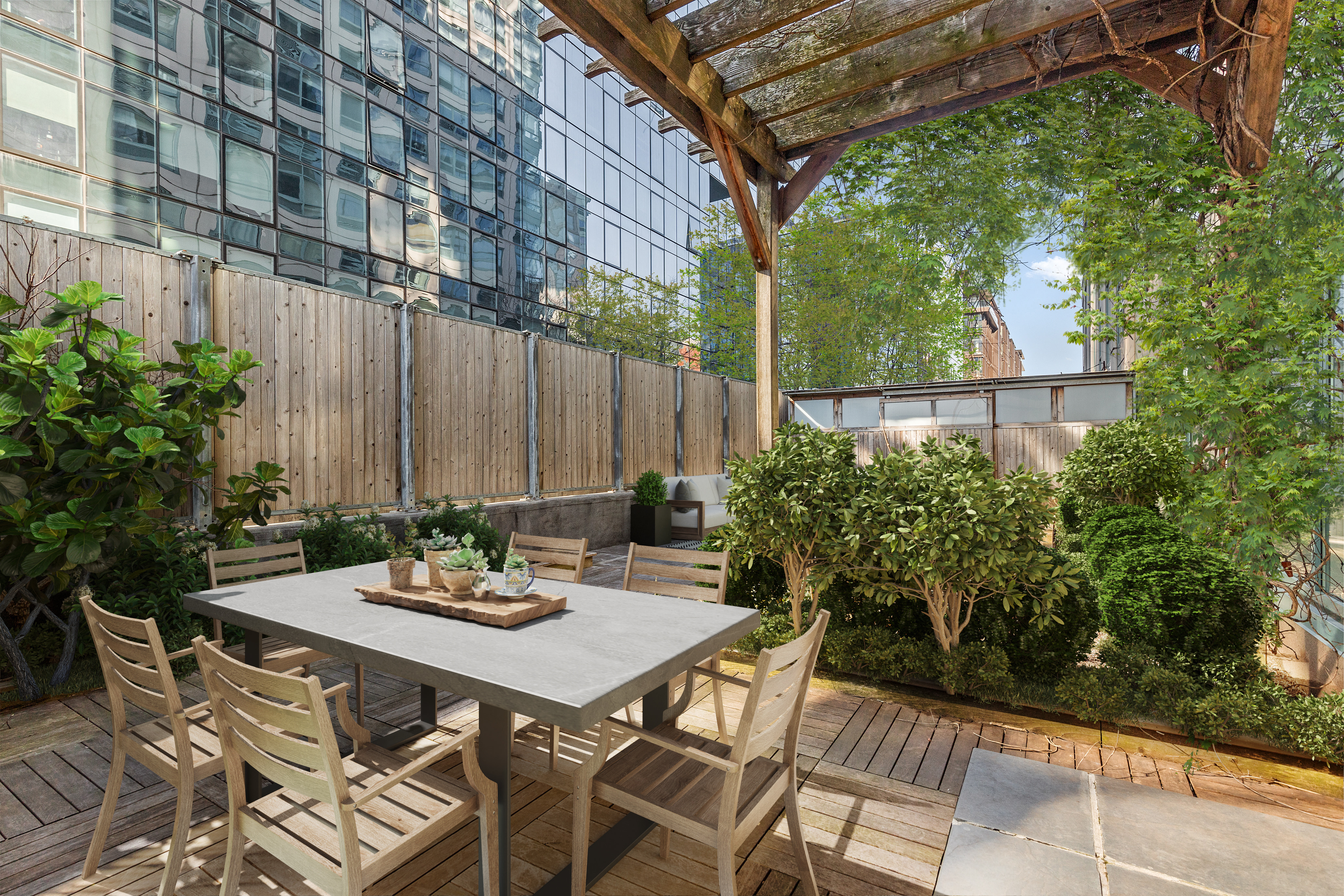 440 Kent Avenue, Unit 1B Brooklyn, NY 11249 - Photo 17 of 20 a view of a patio with a table and chairs