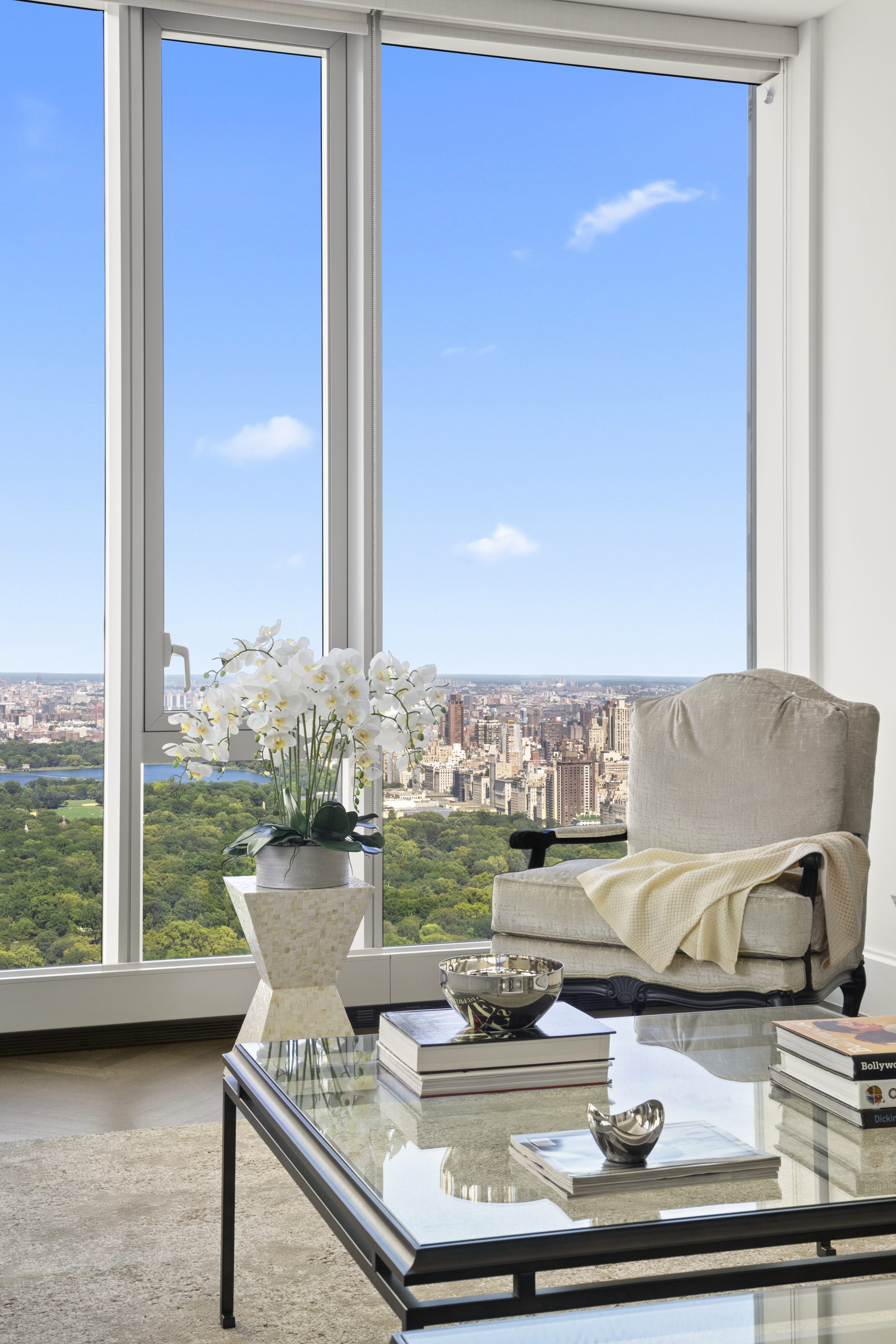 217 West 57th Street, Unit 58W Manhattan, NY 10019 - Photo 3 of 30 a living room with furniture