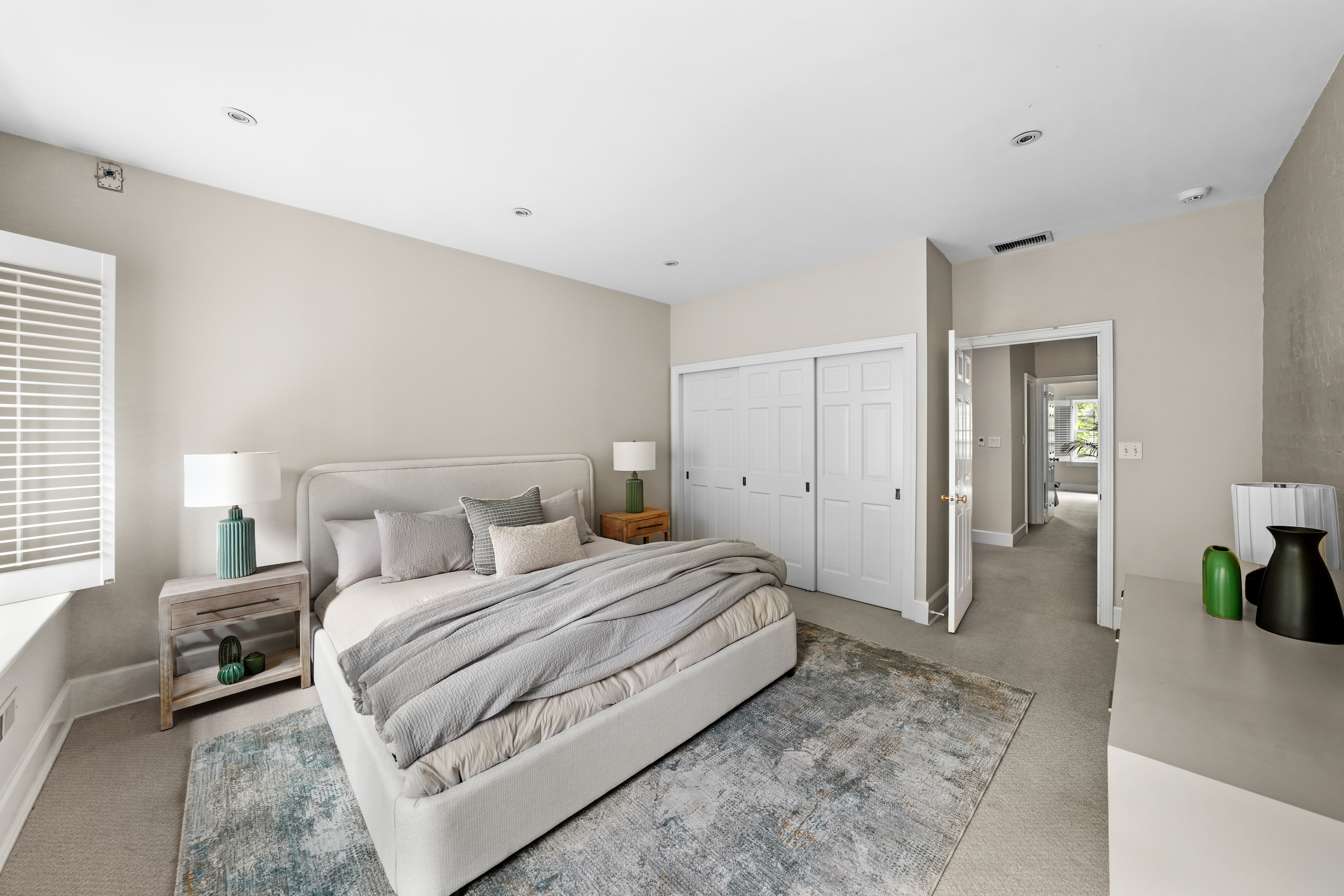 247 East 71st Street Manhattan, NY 10021 - Photo 21 of 31 a bedroom with a bed and a couch