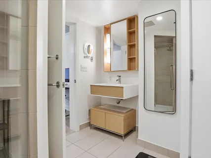 a bathroom with a sink and a mirror