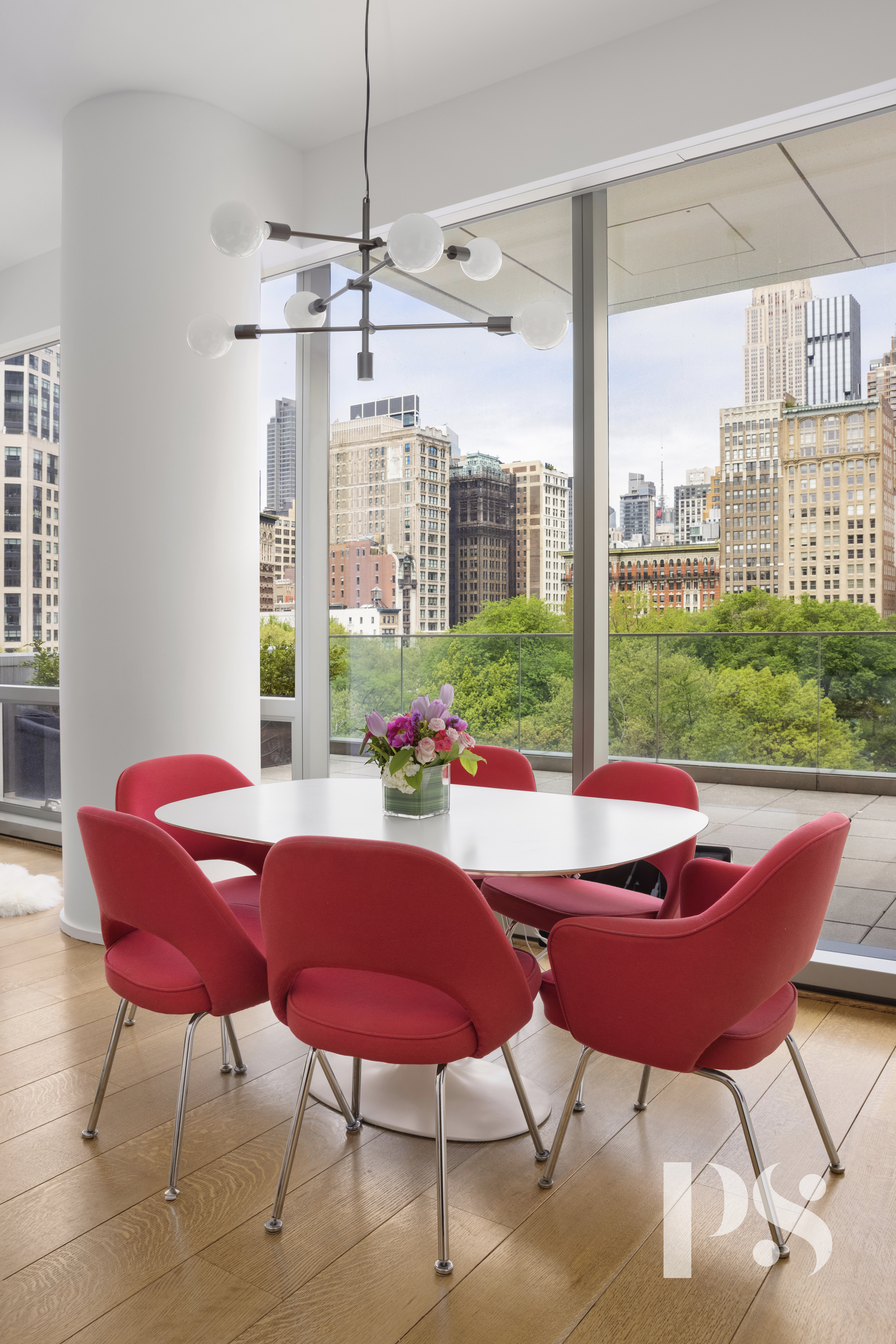 23 East 22nd Street, Unit 8A Manhattan, NY 10010 - Photo 6 of 25 a view of a dining room with furniture window and wooden floor