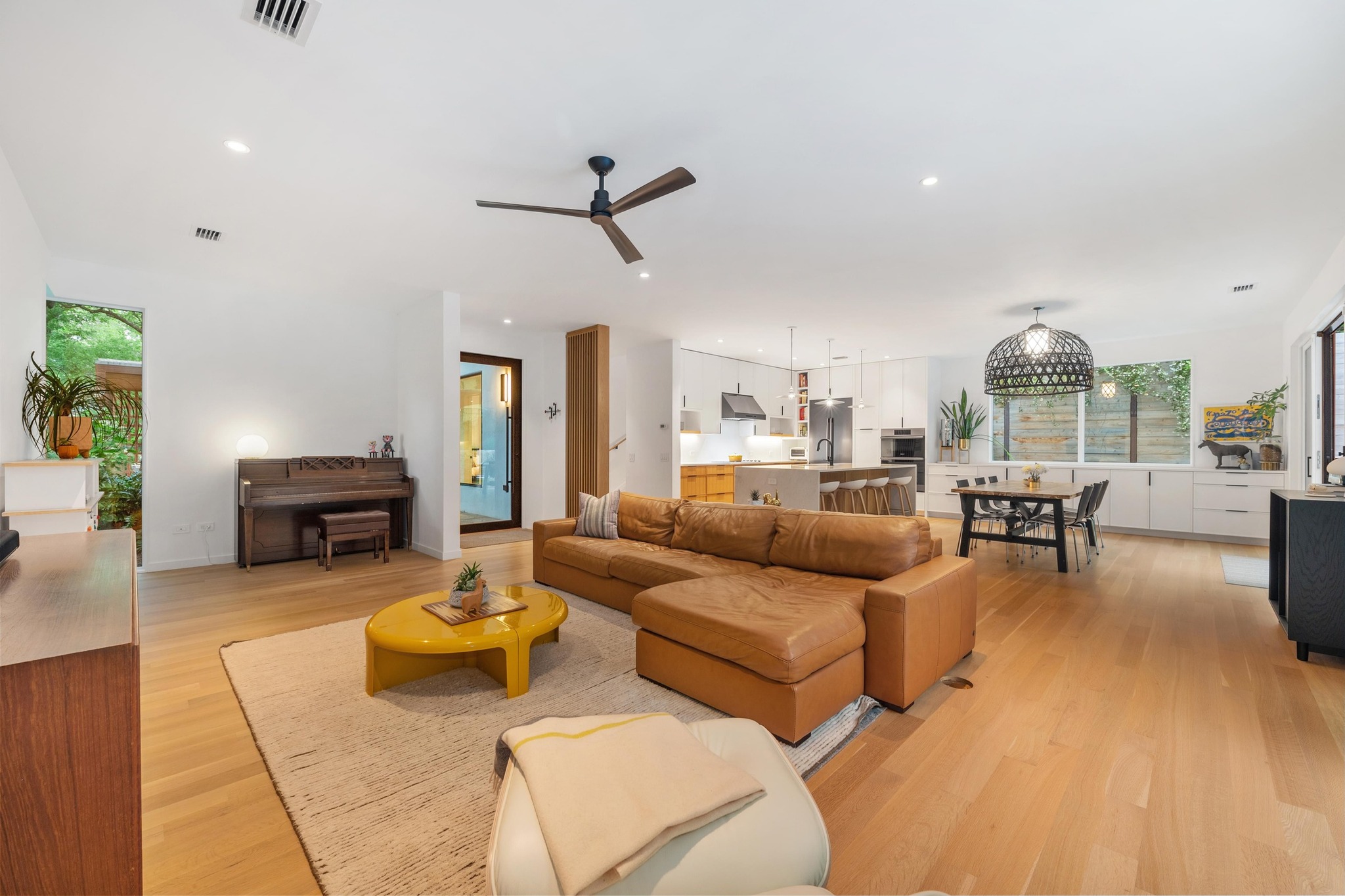 1206 Bickler Road Austin, TX 78704 - Photo 20 of 65 a living room with furniture and a view of kitchen