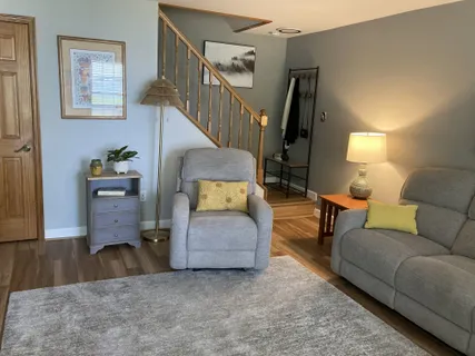 a living room with furniture and a couch