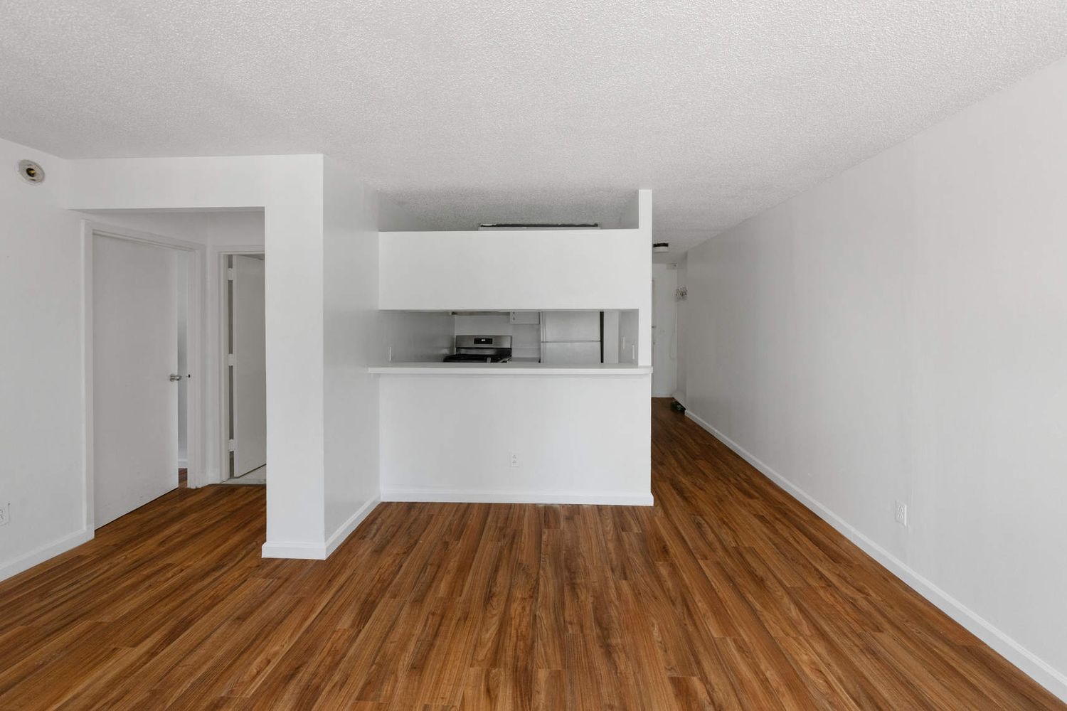 376 Broadway, Unit 8F Manhattan, NY 10013 - Photo 13 of 20 a view of a room with wooden floor