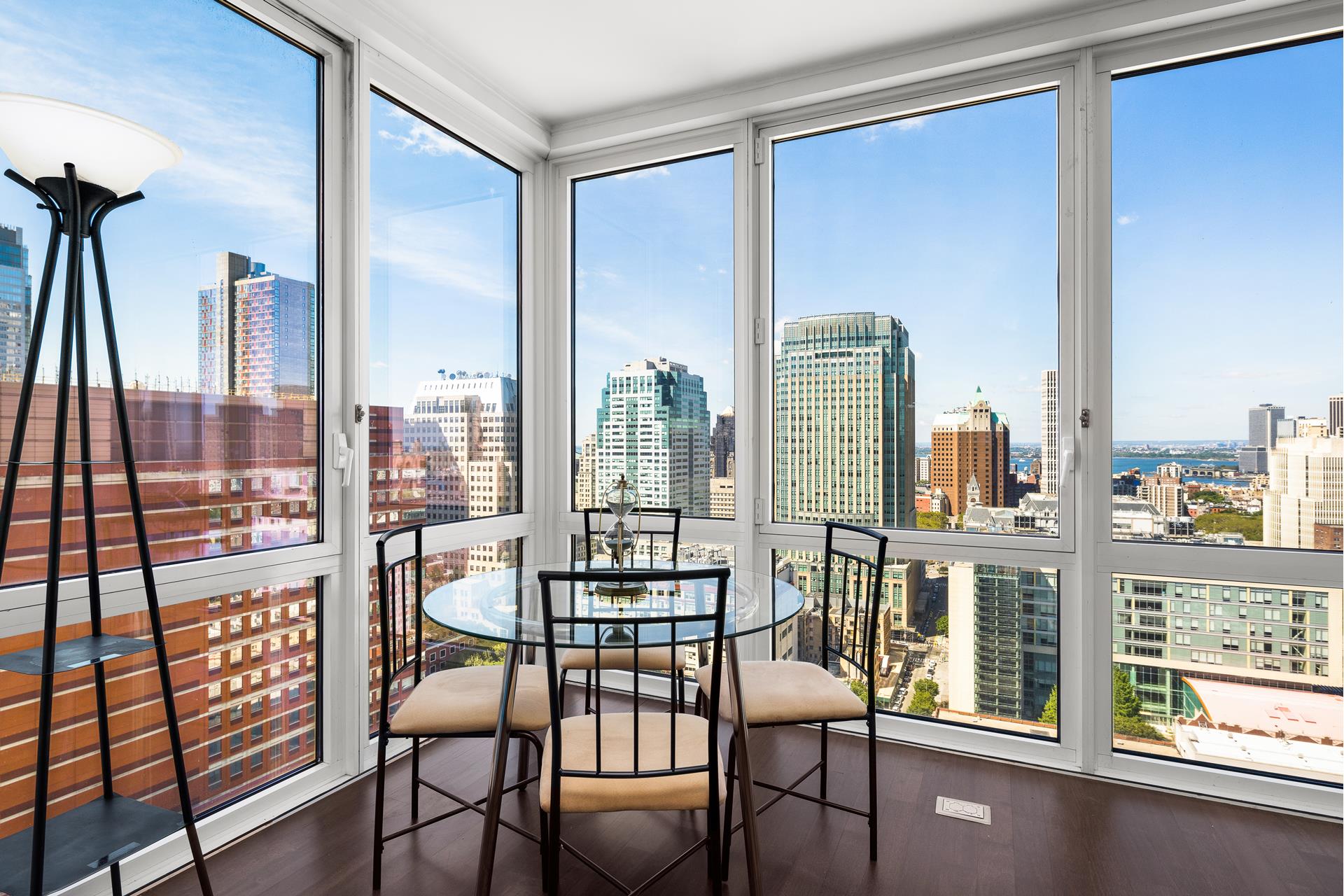 306 Gold Street, Unit 31E Brooklyn, NY 11201 - Photo 4 of 15 a view of a balcony with chairs