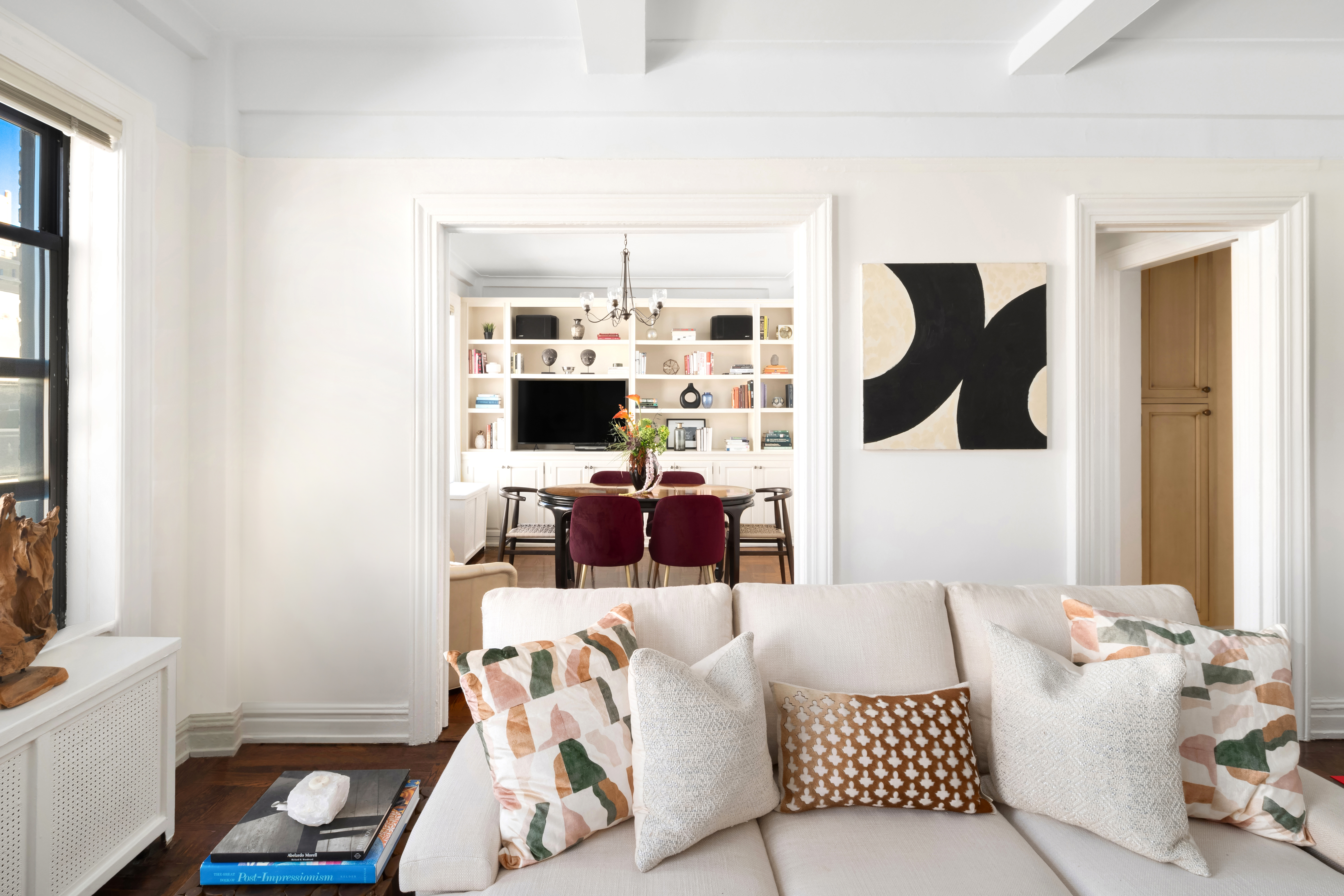 41 West 82nd Street, Unit 9D Manhattan, NY 10024 - Photo 1 of 15 a living room with furniture and white floor