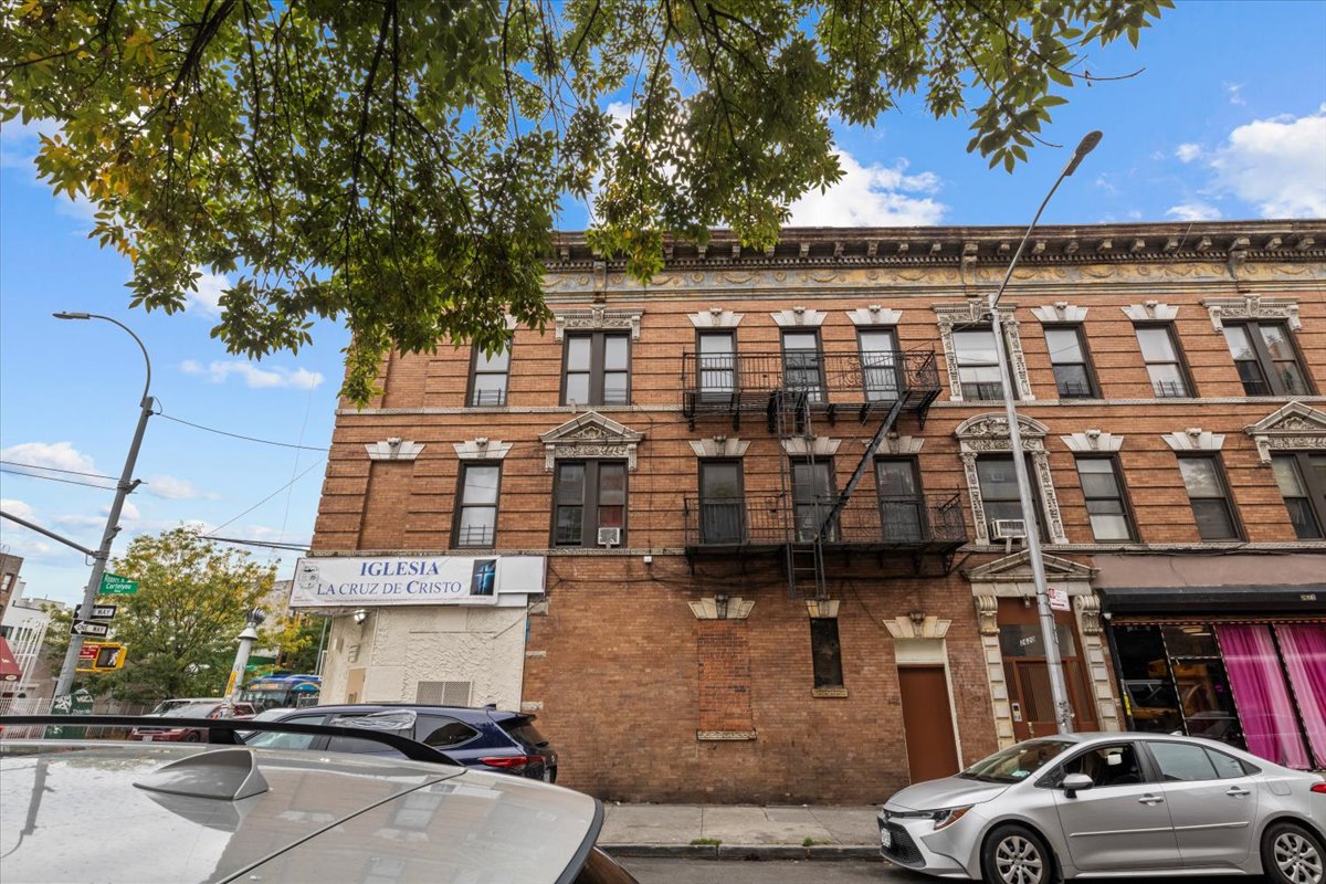 1056 Rogers Avenue Brooklyn, NY 11226 - Photo 9 of 9 front view of a building with a street