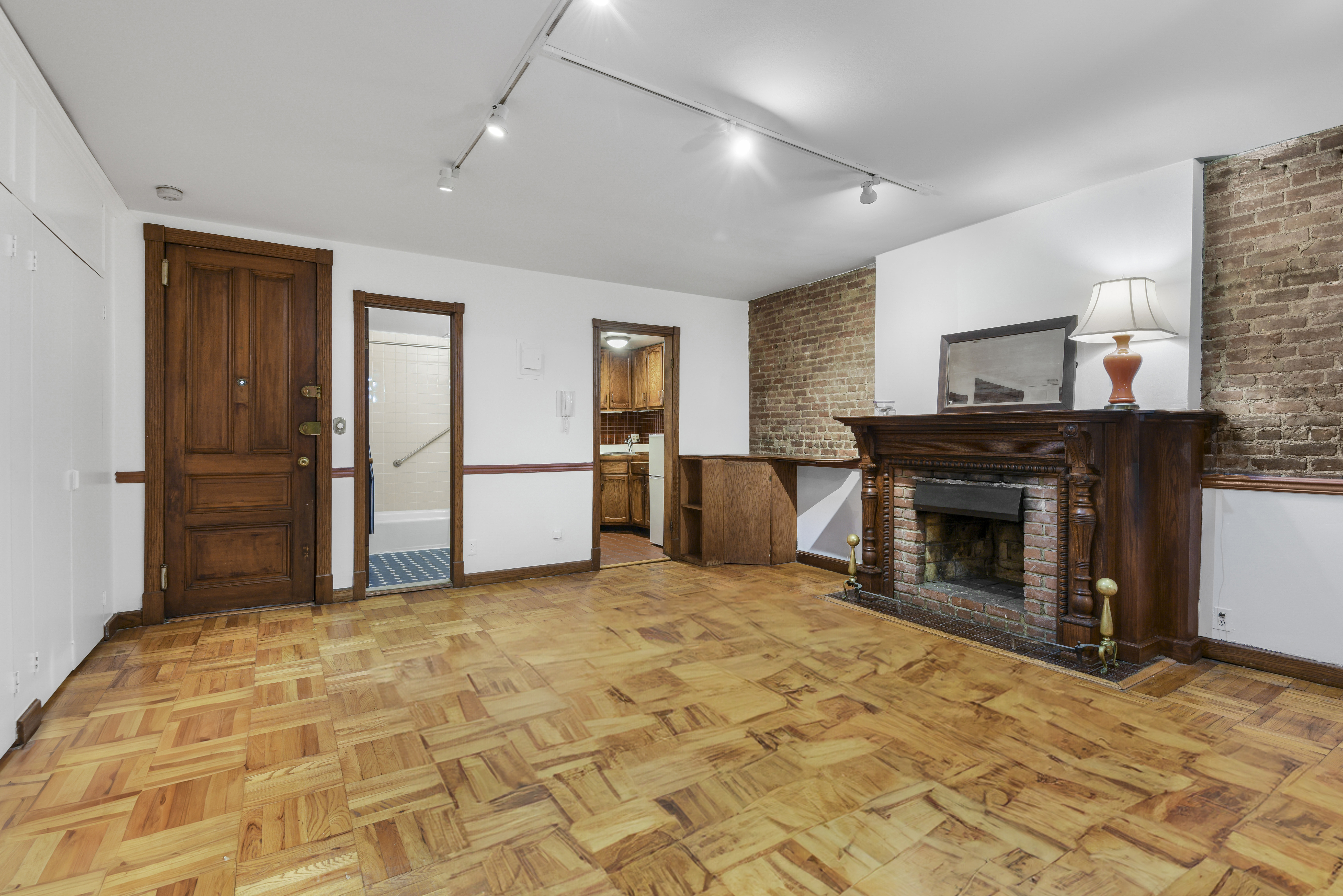 146 West 80th Street, Unit BR Manhattan, NY 10024 - Photo 10 of 16 a view of a livingroom with a fireplace