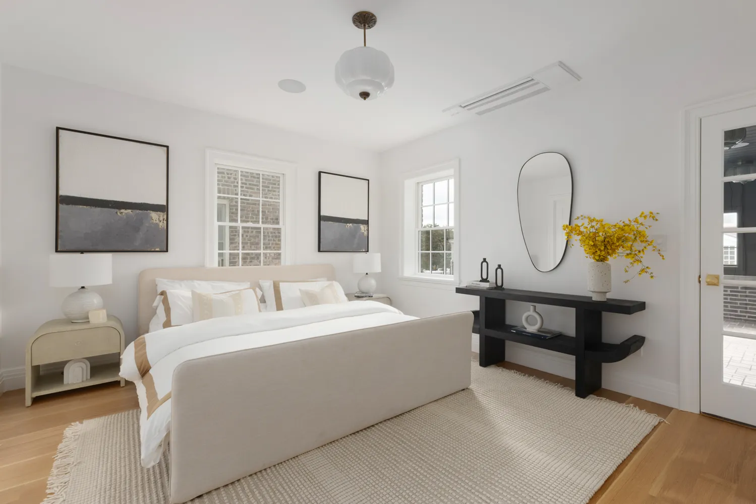 an empty room with wooden floor and closet