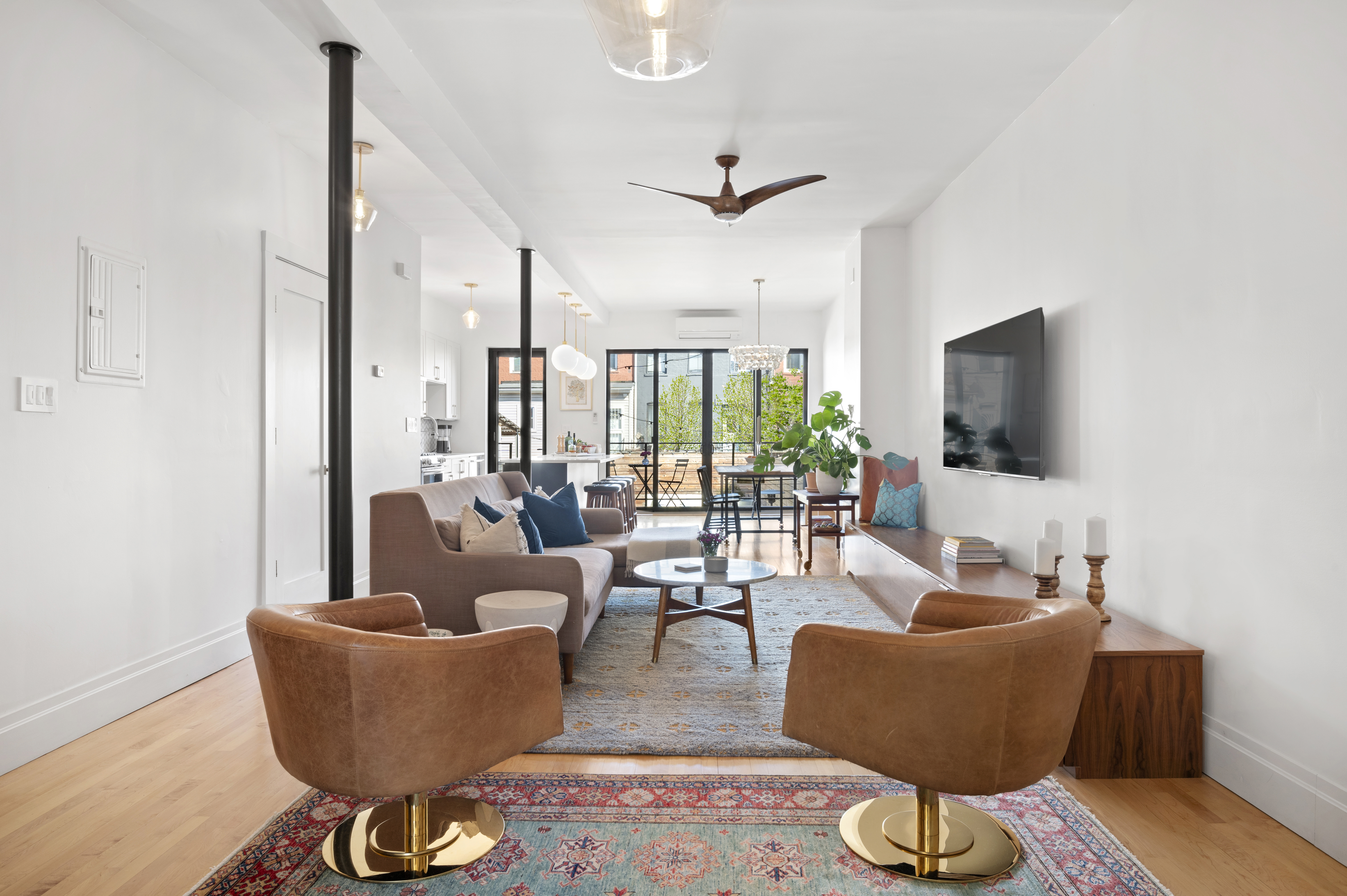 185 East 31st Street Brooklyn, NY 11226 - Photo 3 of 23 a living room with furniture and a flat screen tv