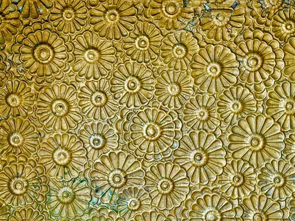 a view of an empty room with window and hardwood floor